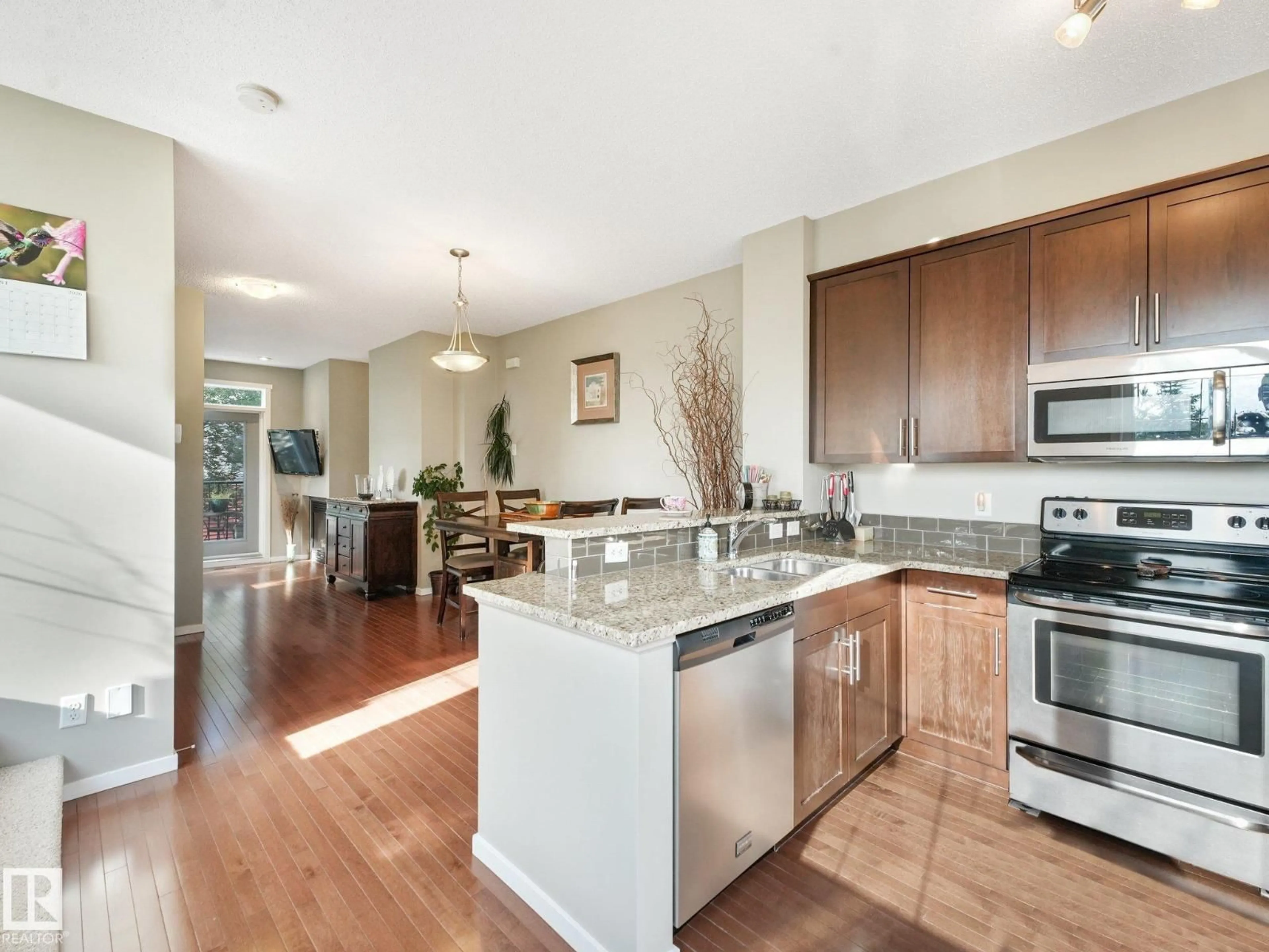 Open concept kitchen, unknown for 603 - 55 WATT BV, Edmonton Alberta T6X0P3