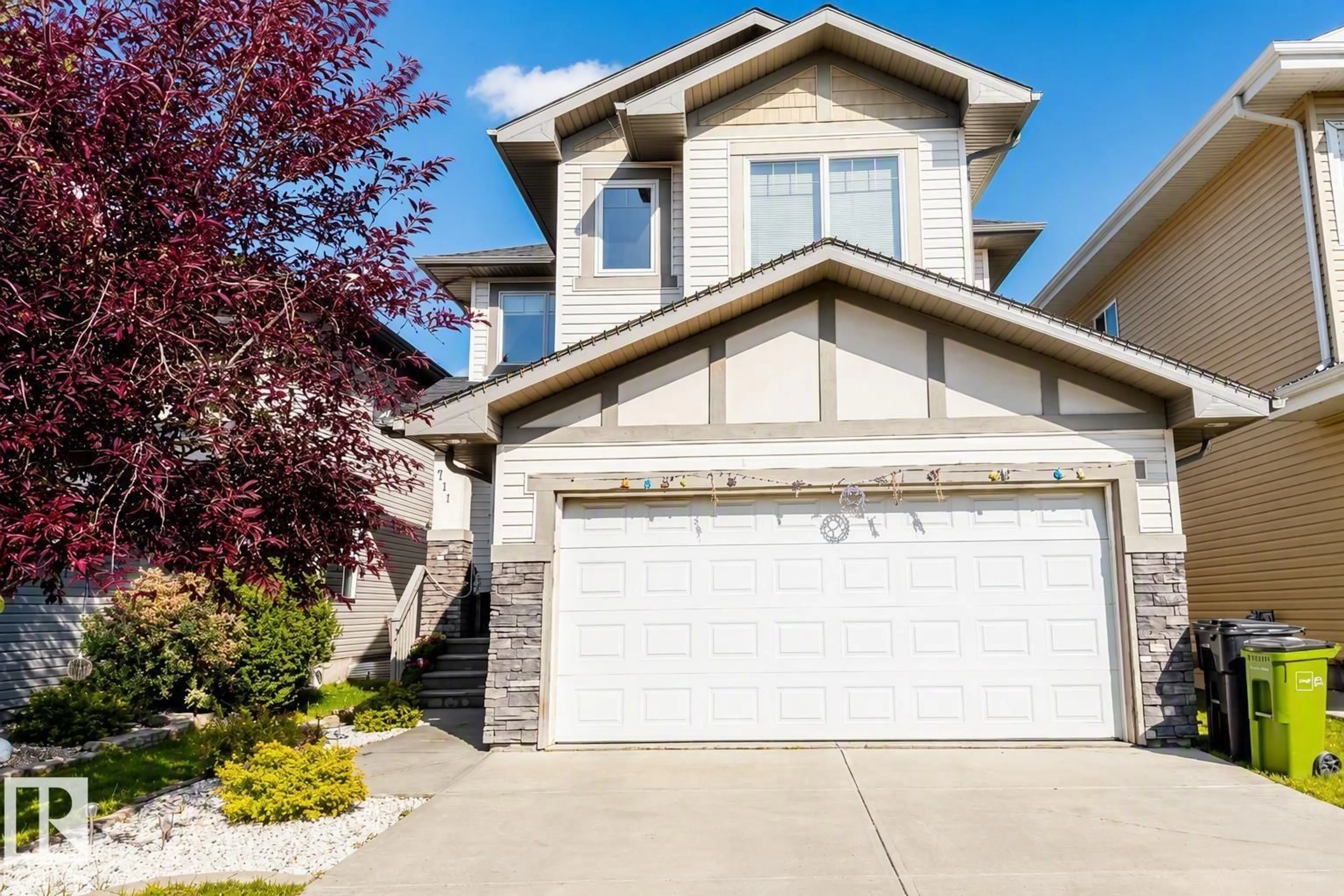 Home with vinyl exterior material, street for 711 57 ST, Edmonton Alberta T6X0G6