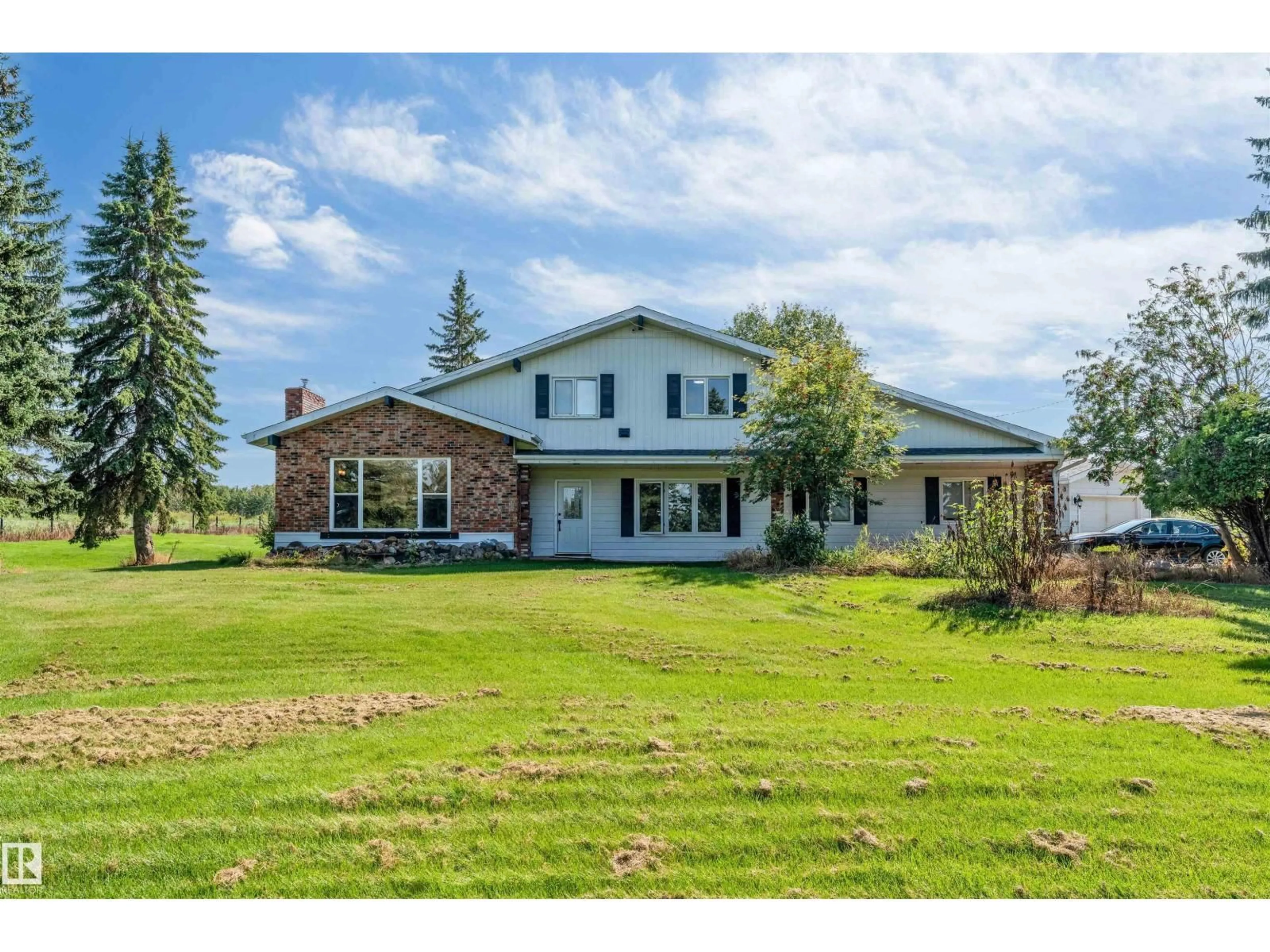 A pic from outside/outdoor area/front of a property/back of a property/a pic from drone, unknown for 337 23109 TWP ROAD 514, Rural Strathcona County Alberta T8B1K9