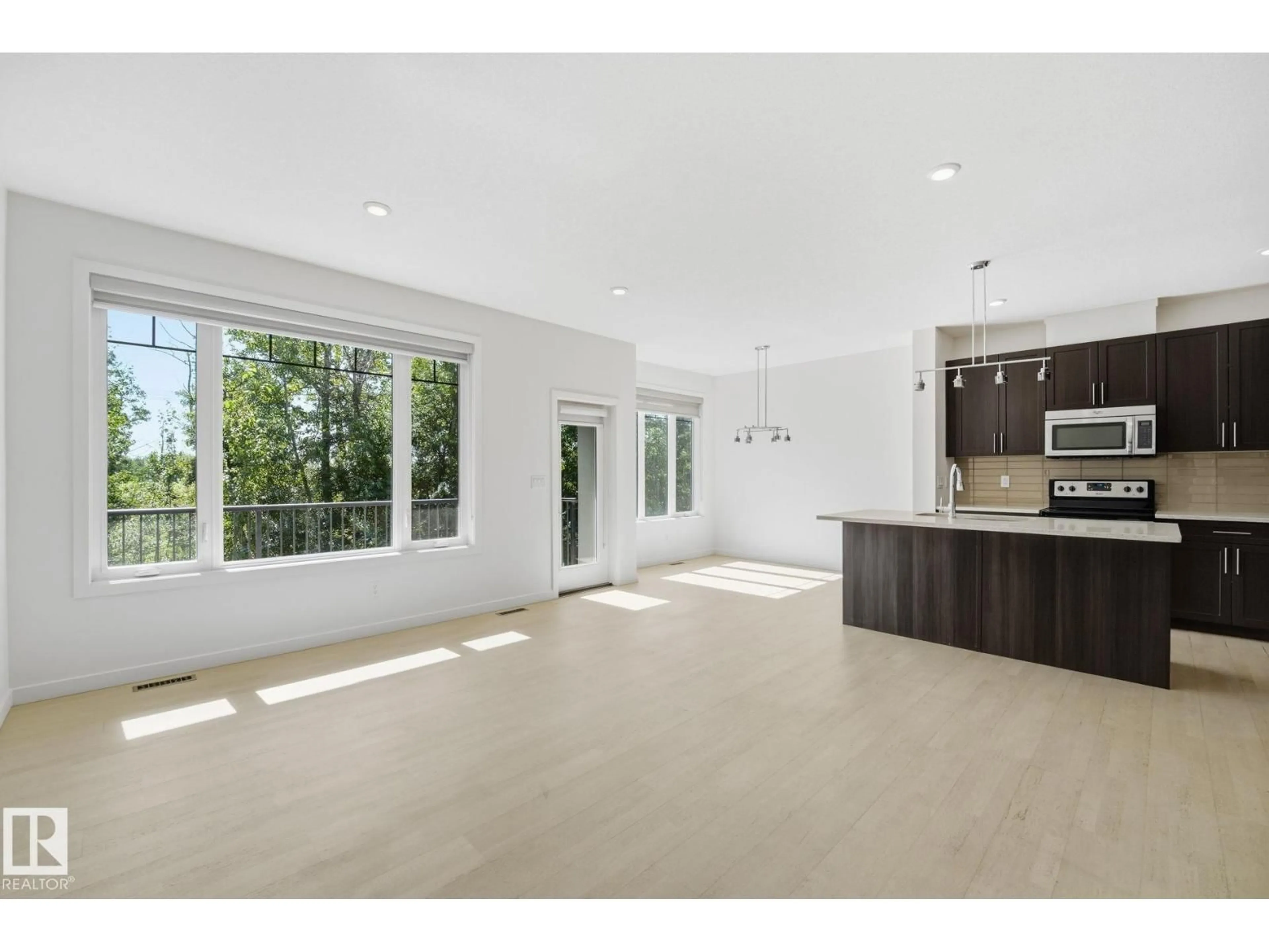 Open concept kitchen, ceramic/tile floor for #47 - 5873 MULLEN PL, Edmonton Alberta T6R0T5