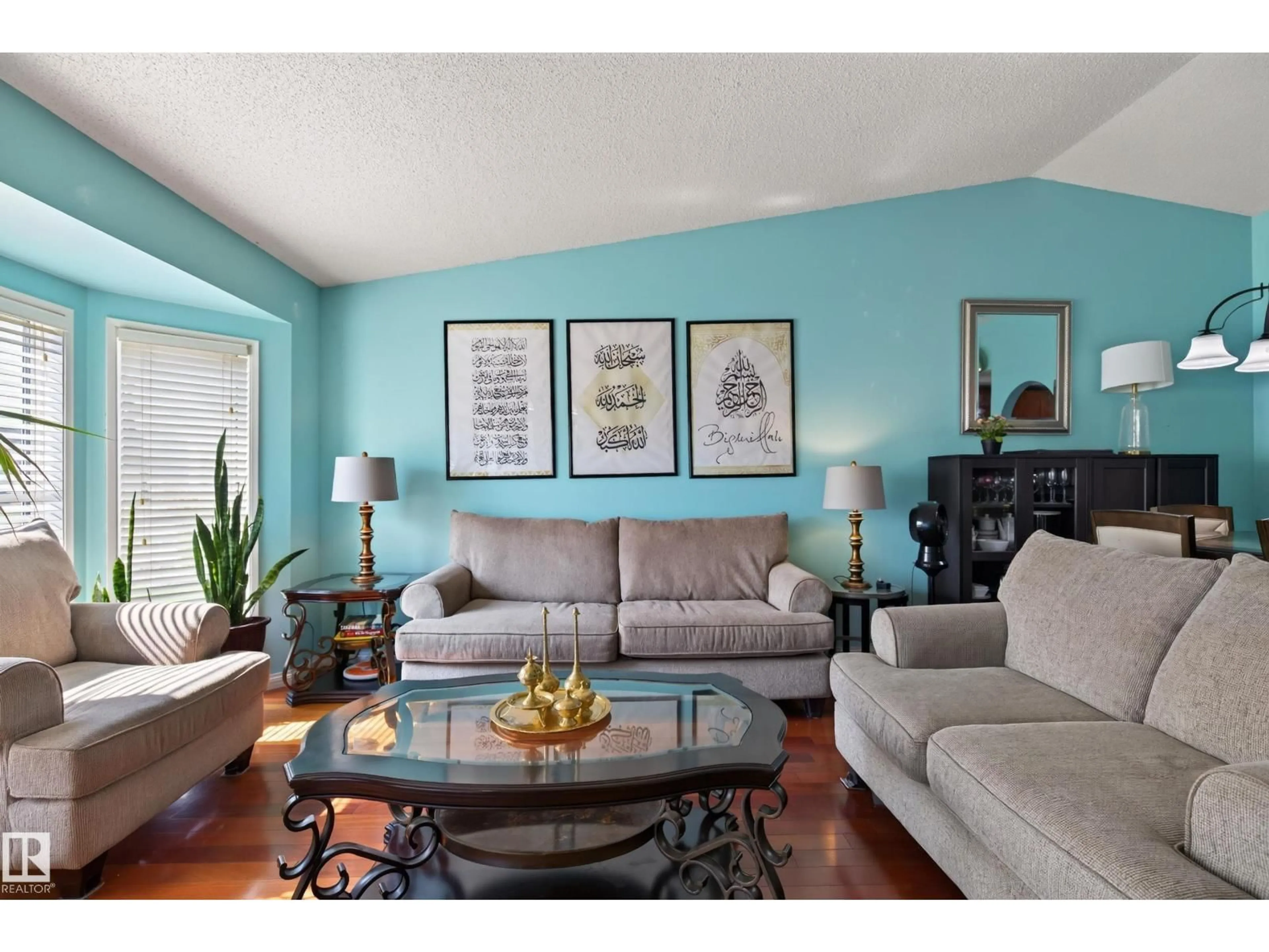 Living room with furniture, wood/laminate floor for 19040 70 AV, Edmonton Alberta T5T5S7