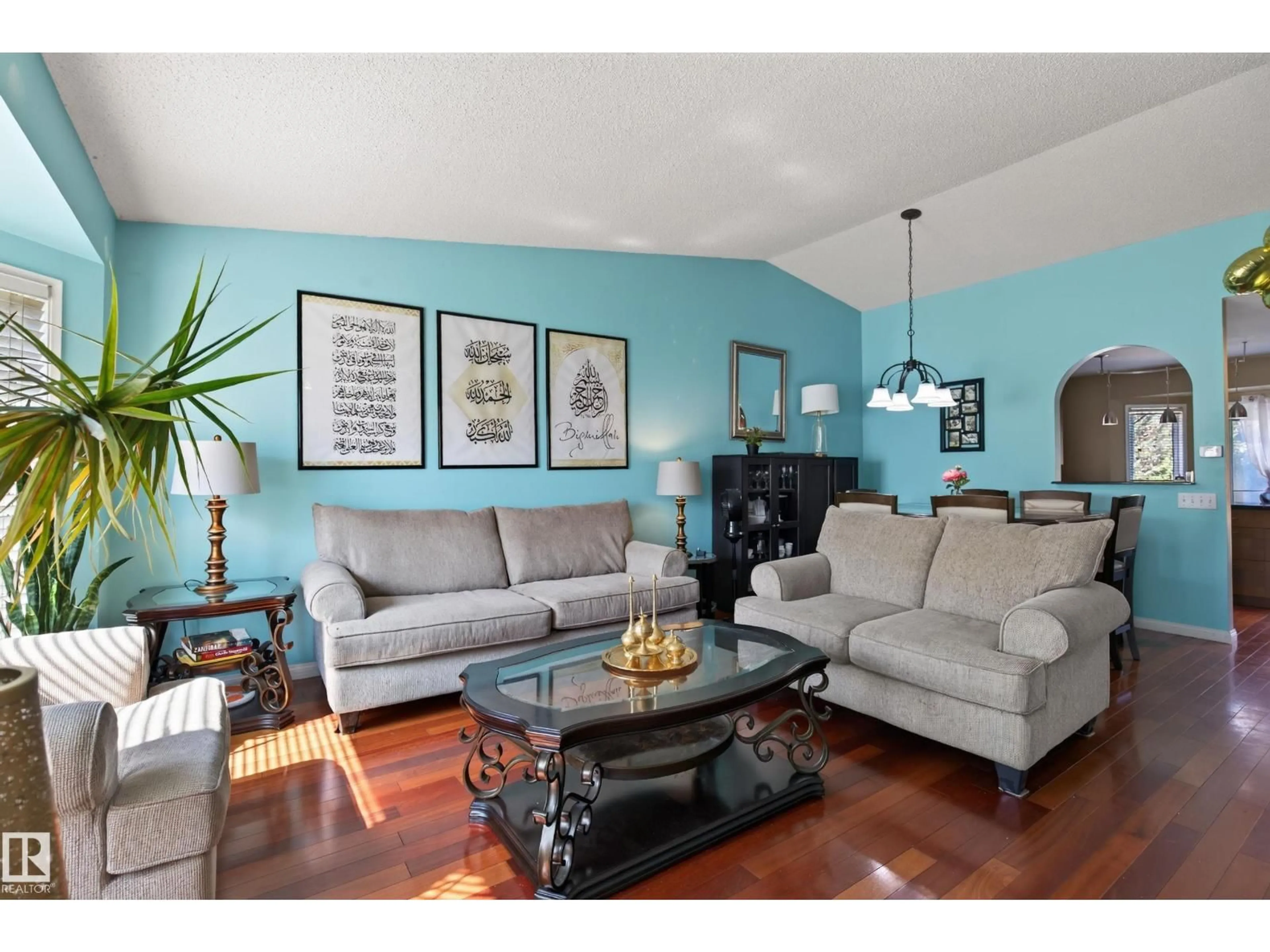 Living room with furniture, wood/laminate floor for 19040 70 AV, Edmonton Alberta T5T5S7