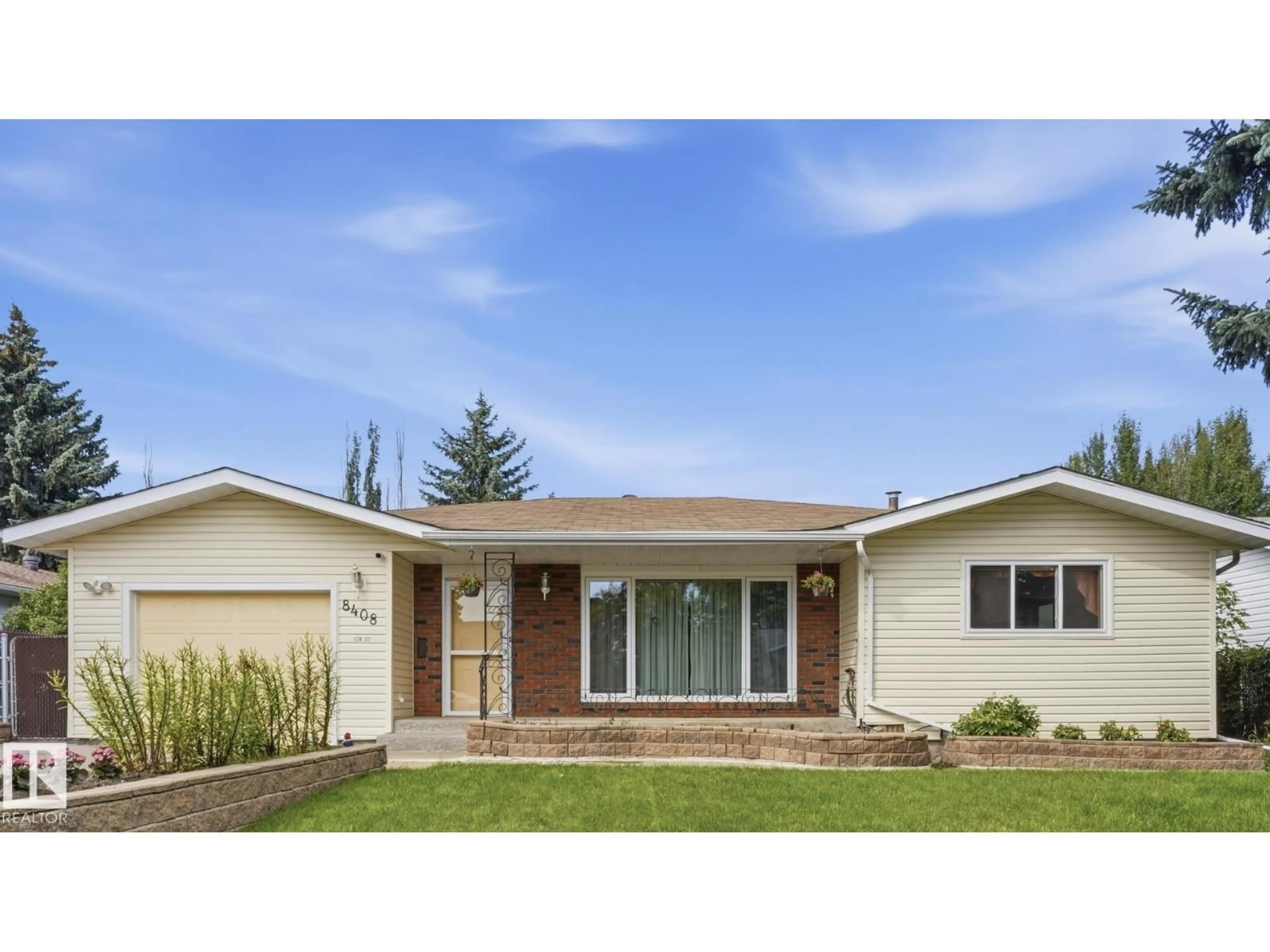 Home with vinyl exterior material, street for NW - 8408 176 ST, Edmonton Alberta T5T0M6
