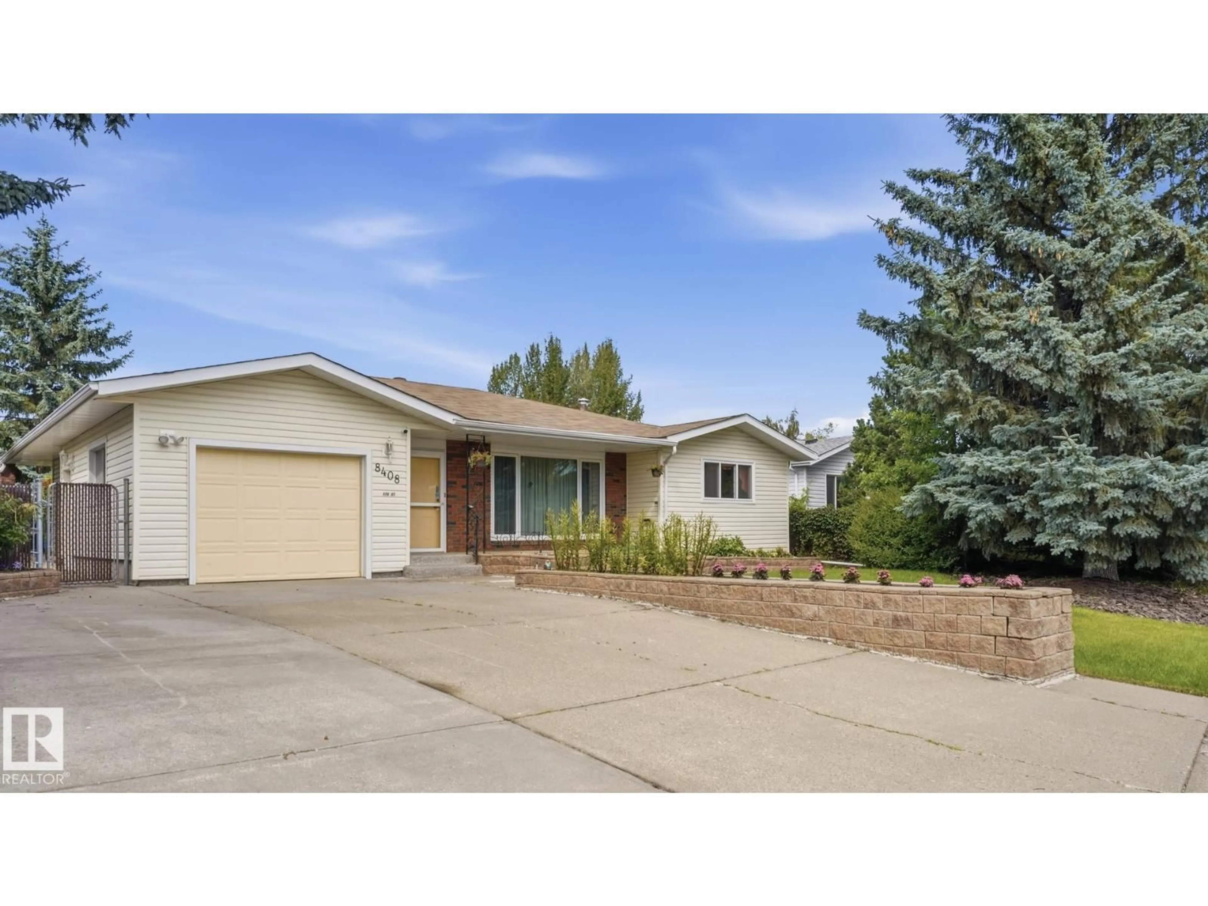 Home with vinyl exterior material, street for NW - 8408 176 ST, Edmonton Alberta T5T0M6