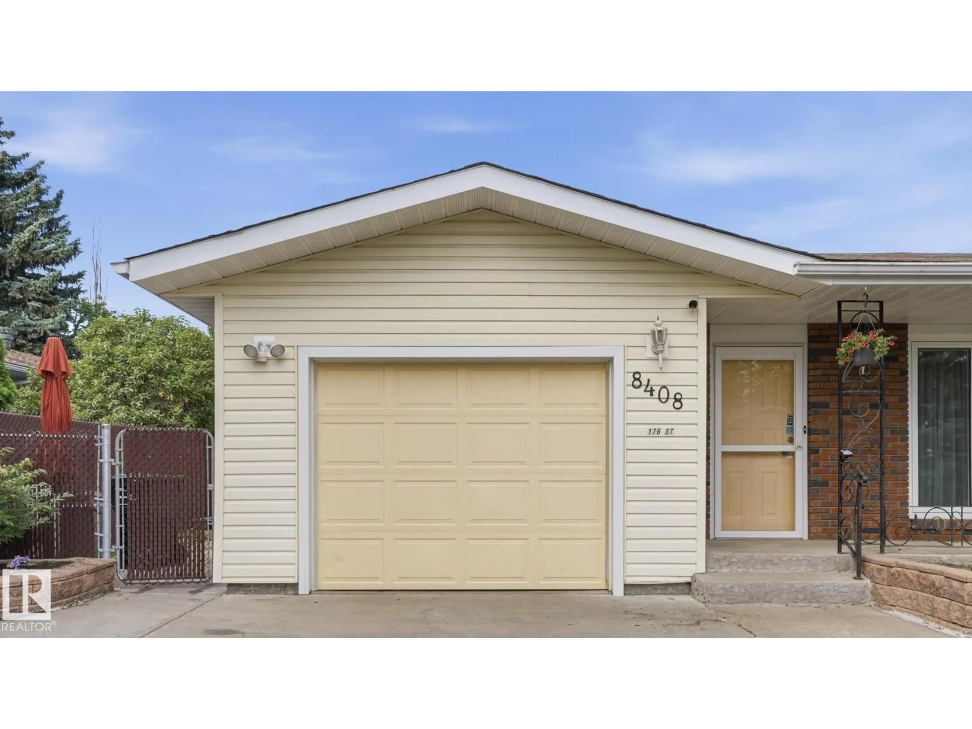 Home with vinyl exterior material, street for NW - 8408 176 ST, Edmonton Alberta T5T0M6