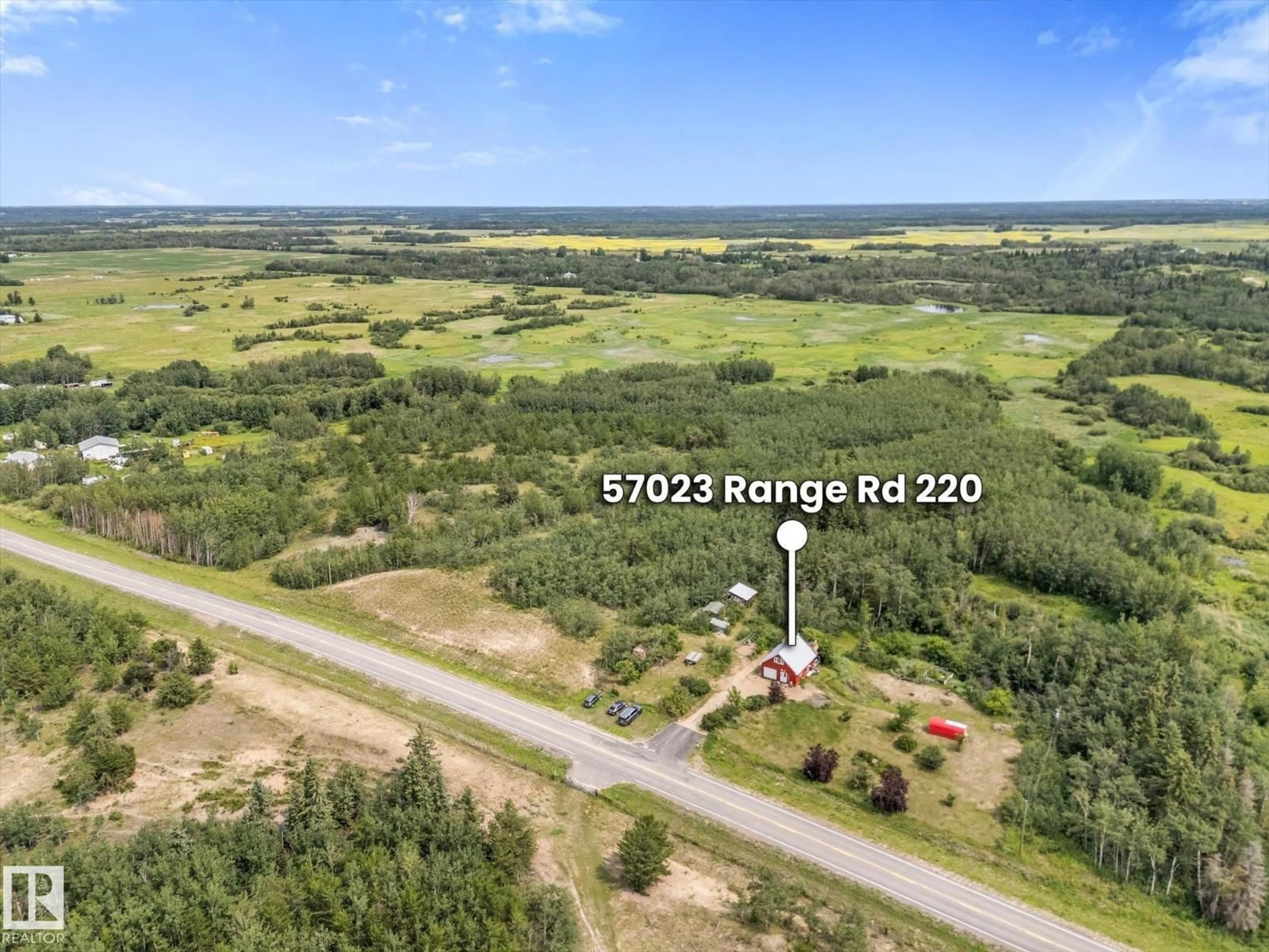 A pic from outside/outdoor area/front of a property/back of a property/a pic from drone, water/lake/river/ocean view for 57023 RGE ROAD 220, Rural Sturgeon County Alberta T0A2W0