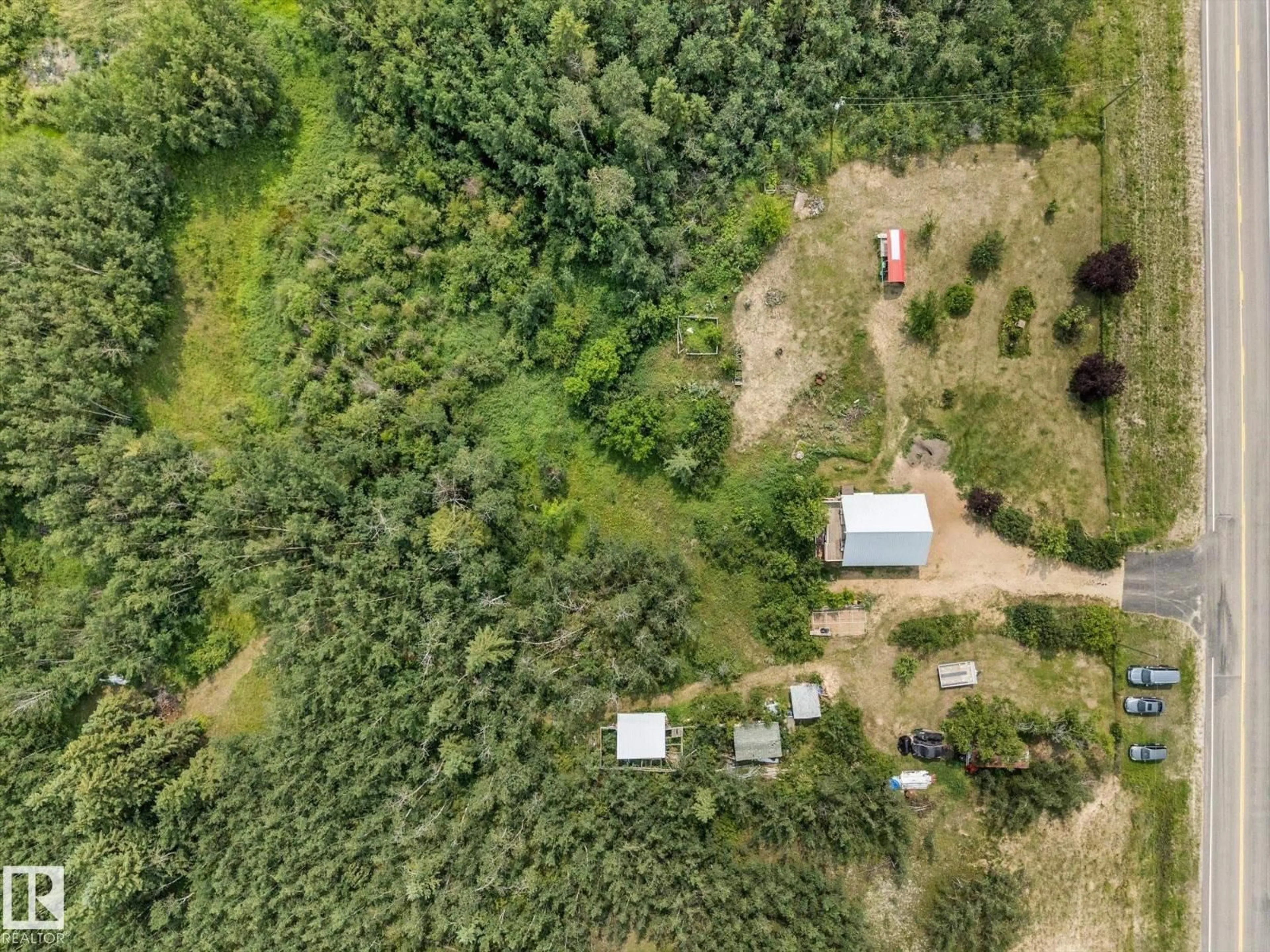 A pic from outside/outdoor area/front of a property/back of a property/a pic from drone, forest/trees view for 57023 RGE ROAD 220, Rural Sturgeon County Alberta T0A2W0