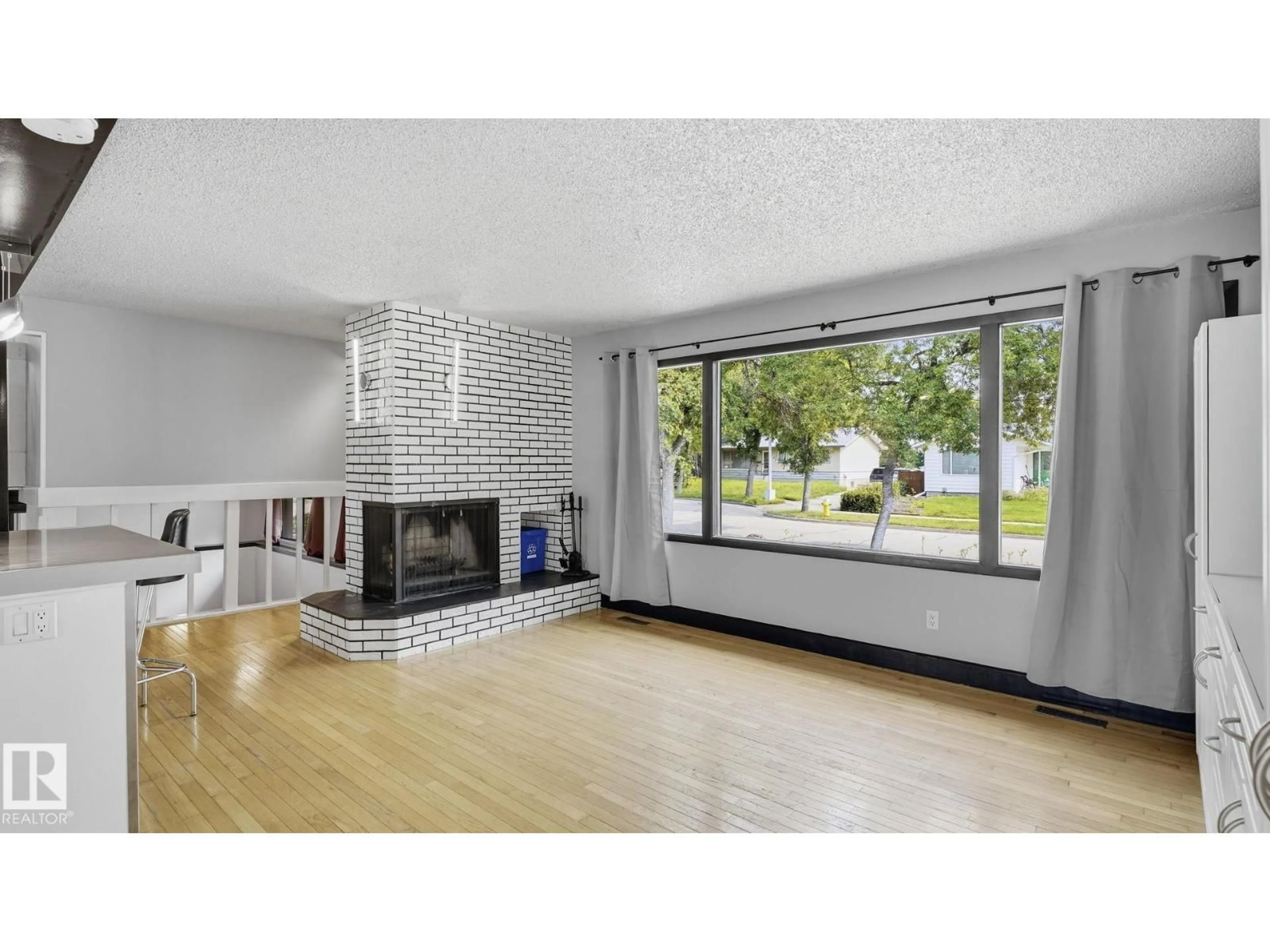 Living room with furniture, unknown for 9216 93 ST, Fort Saskatchewan Alberta T8L1M1