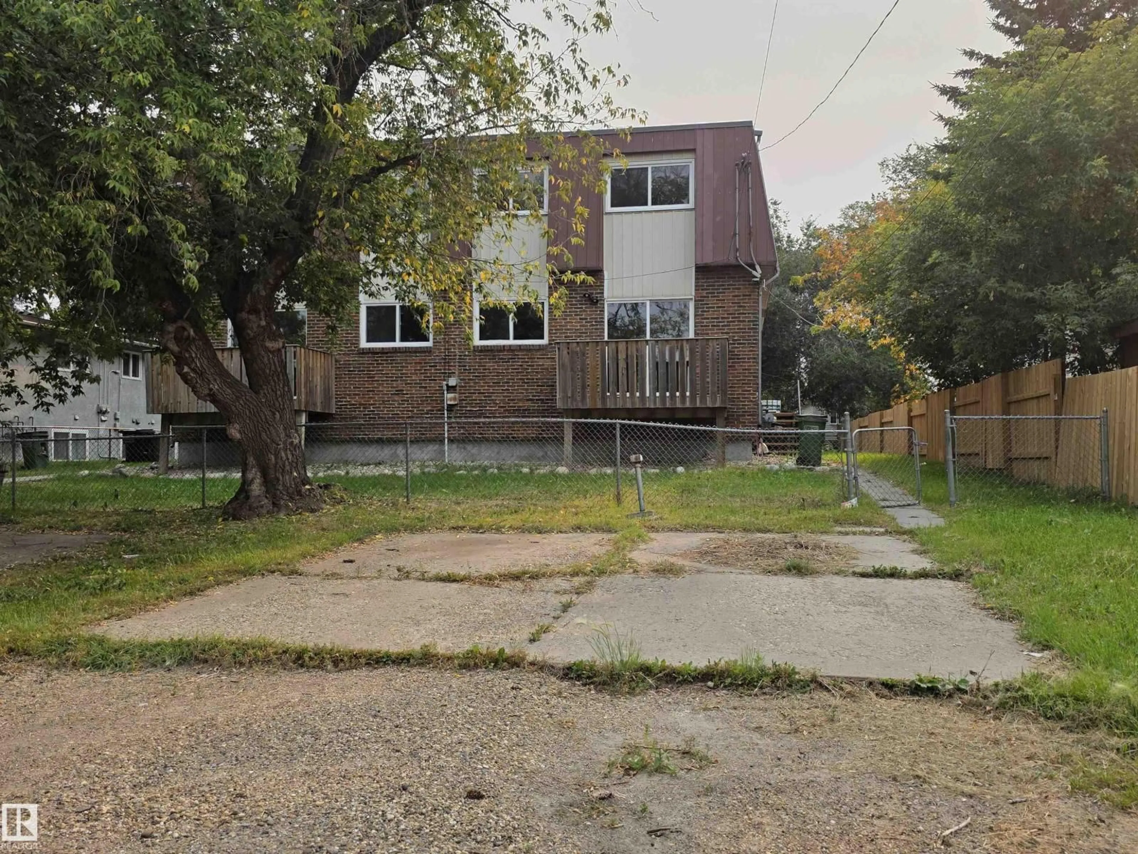 A pic from outside/outdoor area/front of a property/back of a property/a pic from drone, street for NW - 12014-12018A 69 ST, Edmonton Alberta T5B1S6