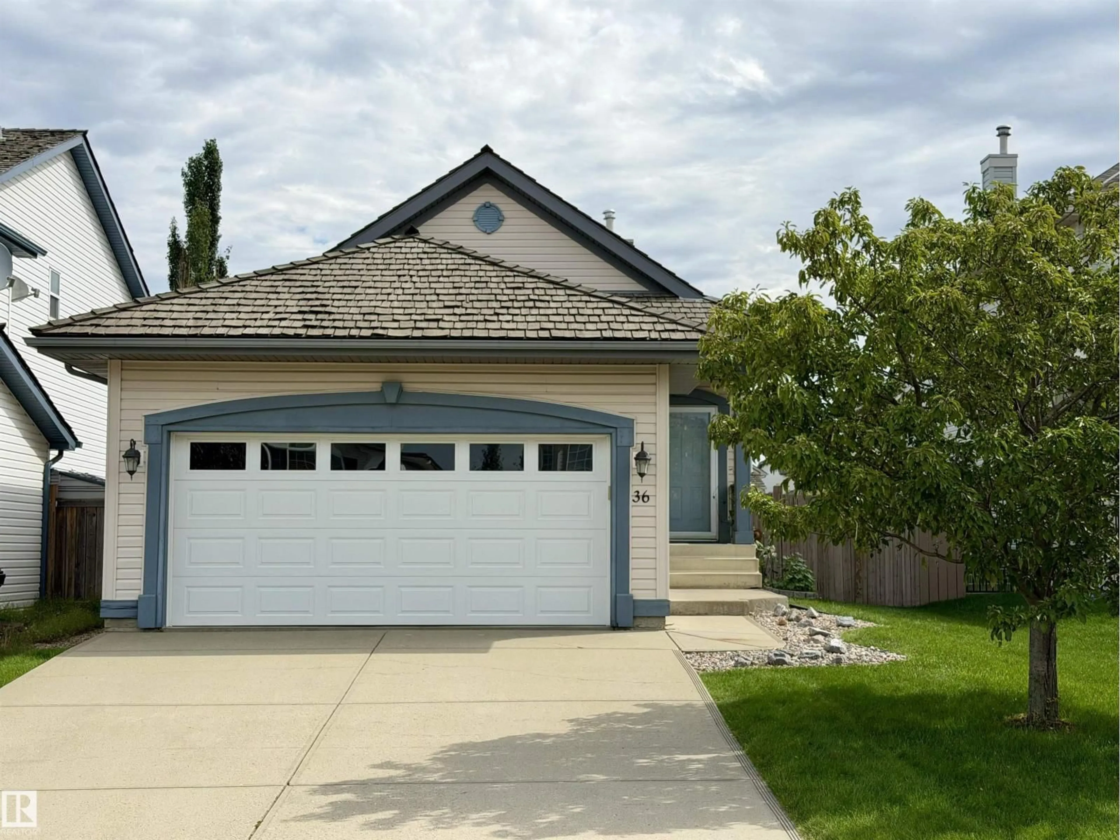 Home with vinyl exterior material, street for 36 NEWCASTLE, Sherwood Park Alberta T8A6E9