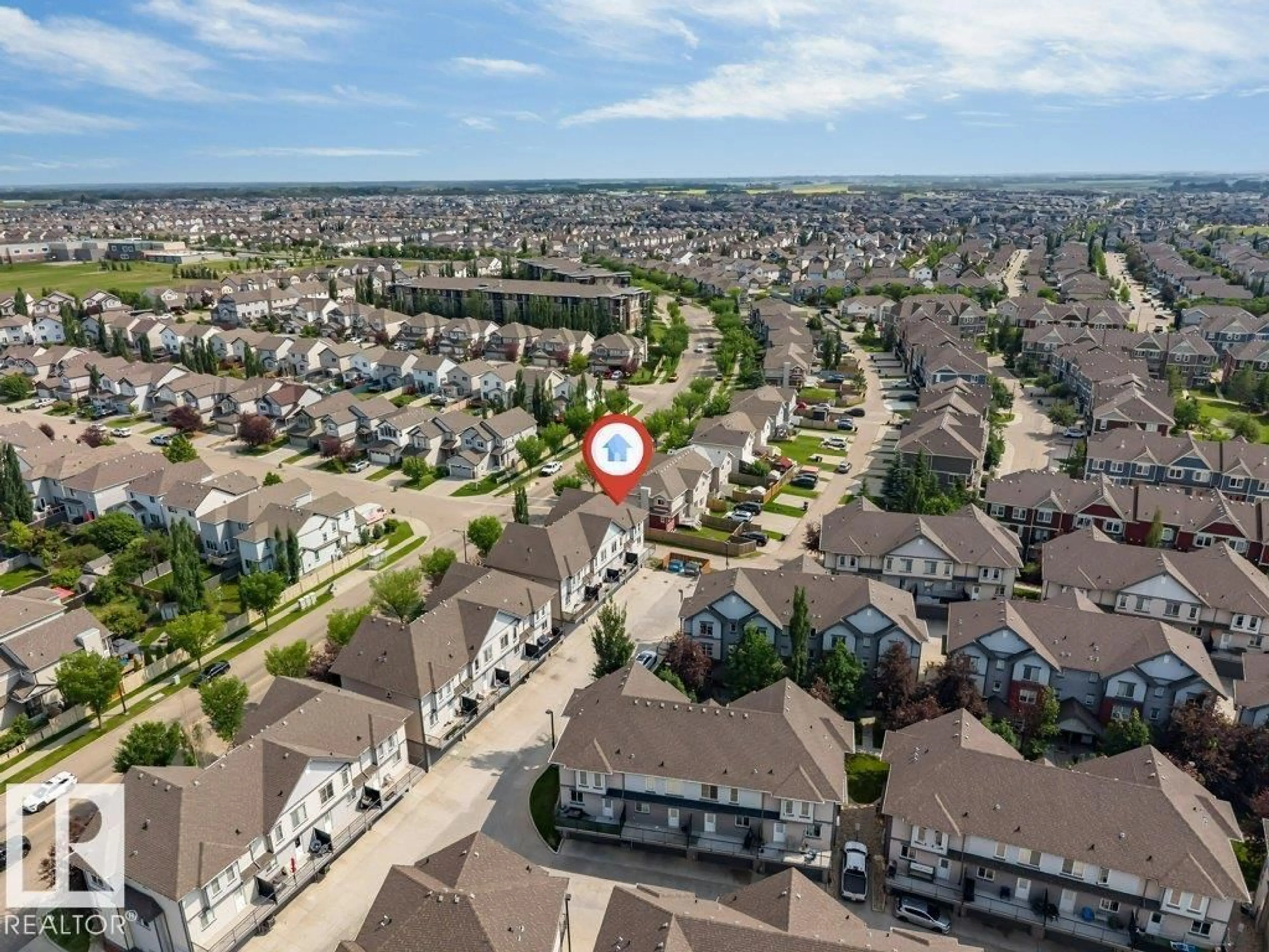A pic from outside/outdoor area/front of a property/back of a property/a pic from drone, street for 655 WATT BV, Edmonton Alberta T6X0Y2