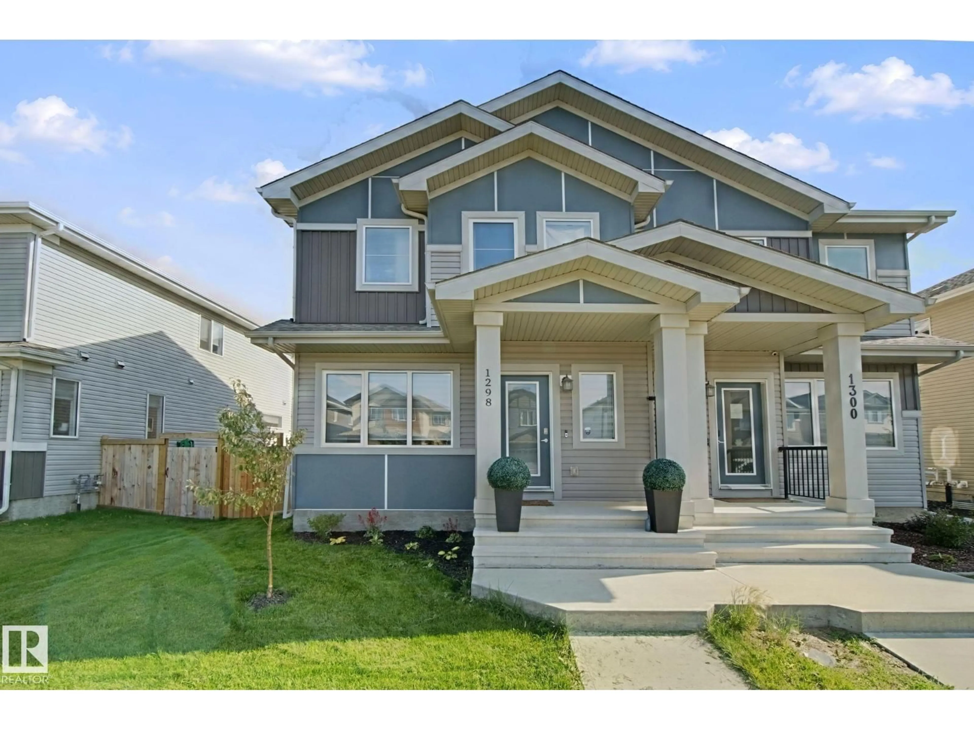 Home with vinyl exterior material, street for 1298 MCCONACHIE BV, Edmonton Alberta T5Y3C5