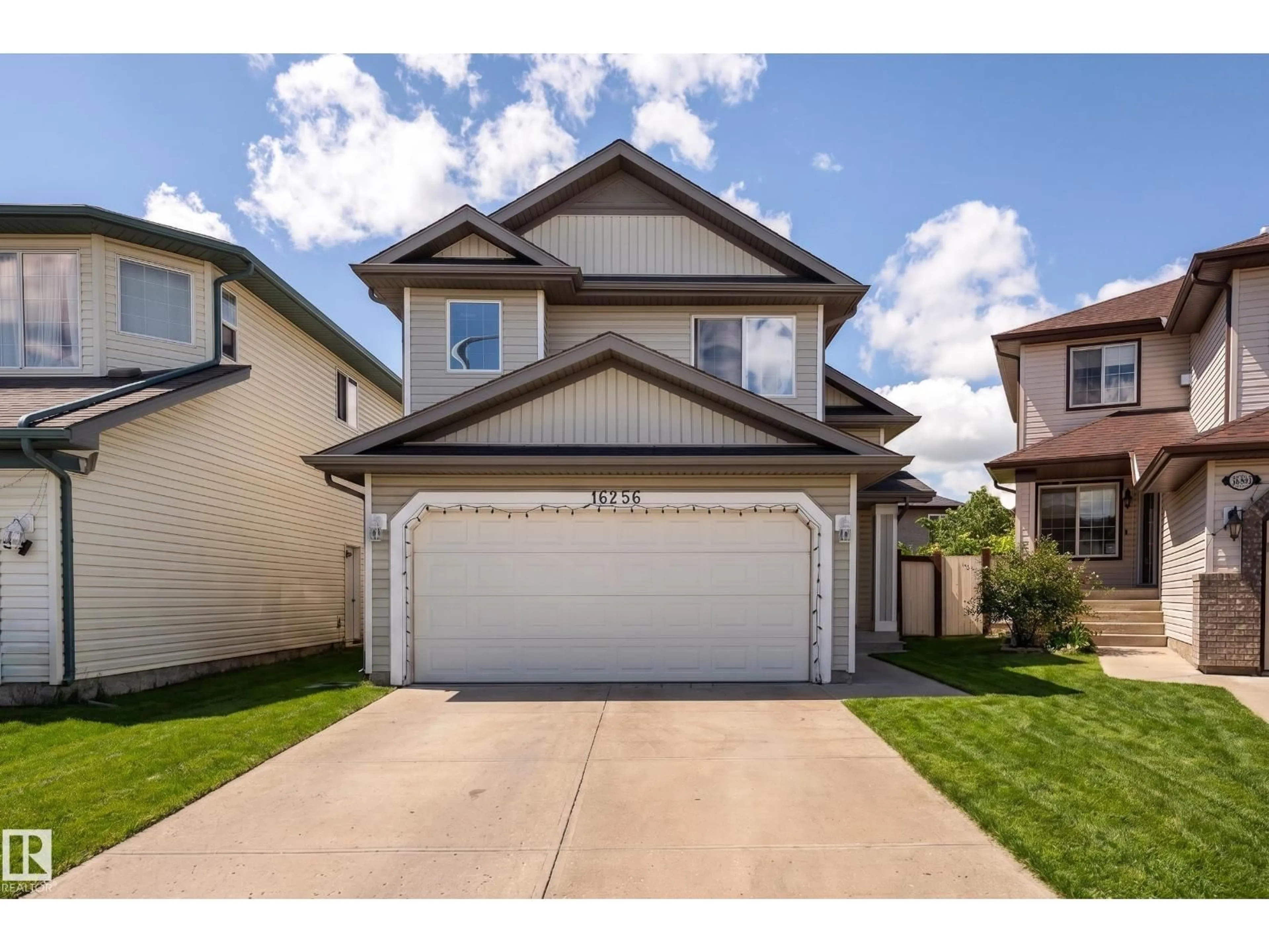 Home with vinyl exterior material, street for NW - 16256 132 ST, Edmonton Alberta T6V1X5