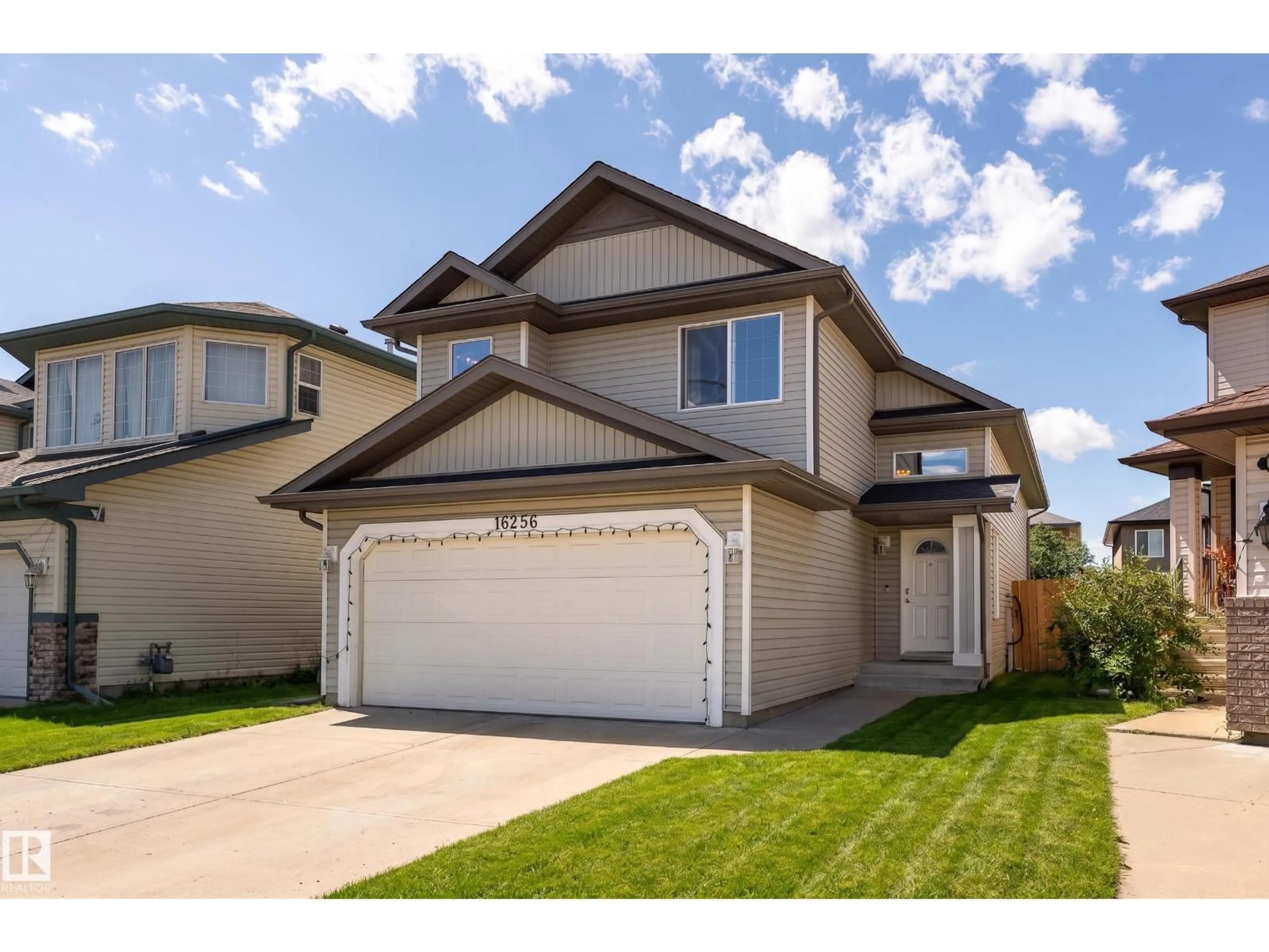 Home with vinyl exterior material, street for NW - 16256 132 ST, Edmonton Alberta T6V1X5