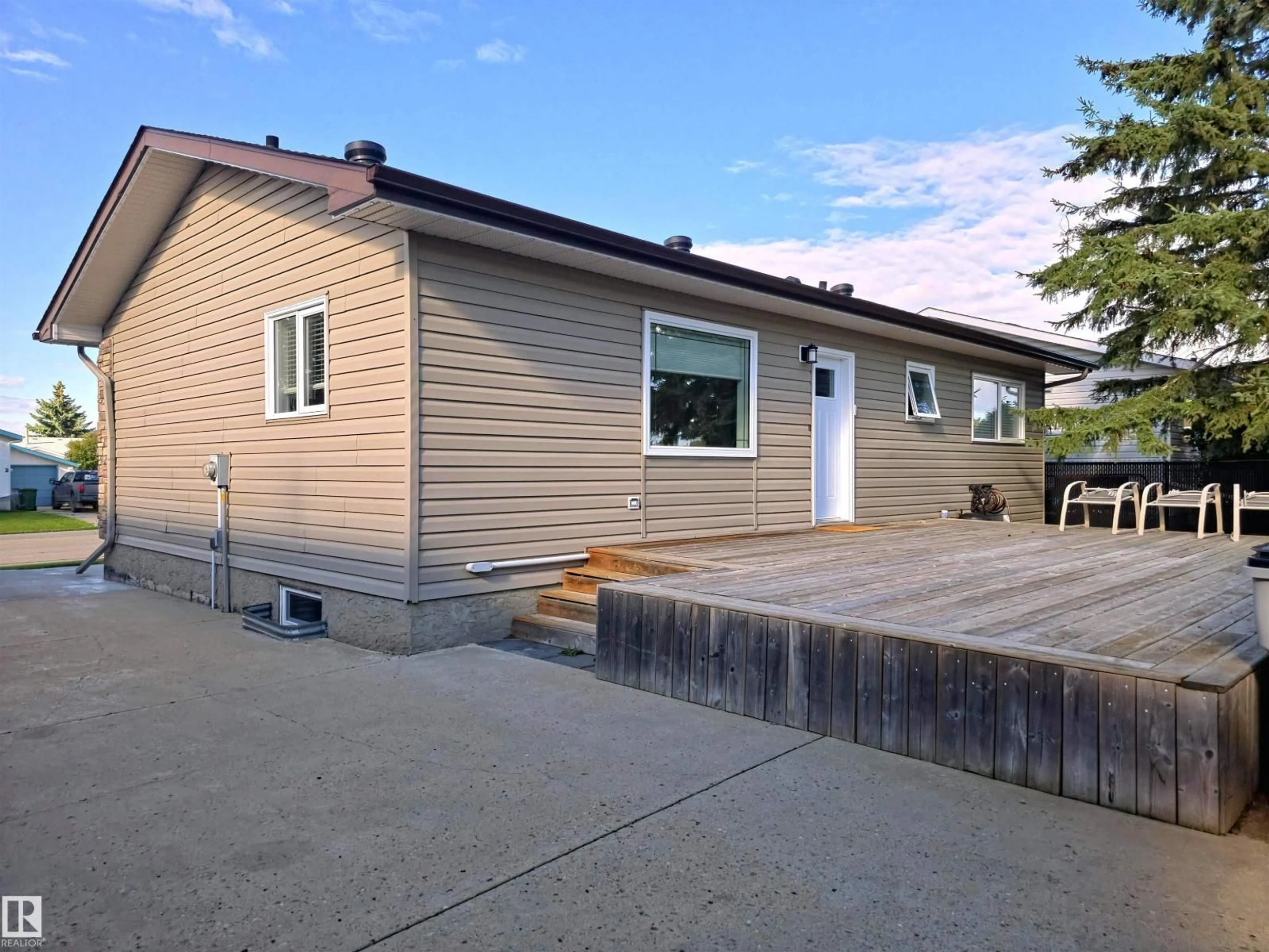 Home with vinyl exterior material, street for 10543 109 ST, Westlock Alberta T7P1A9
