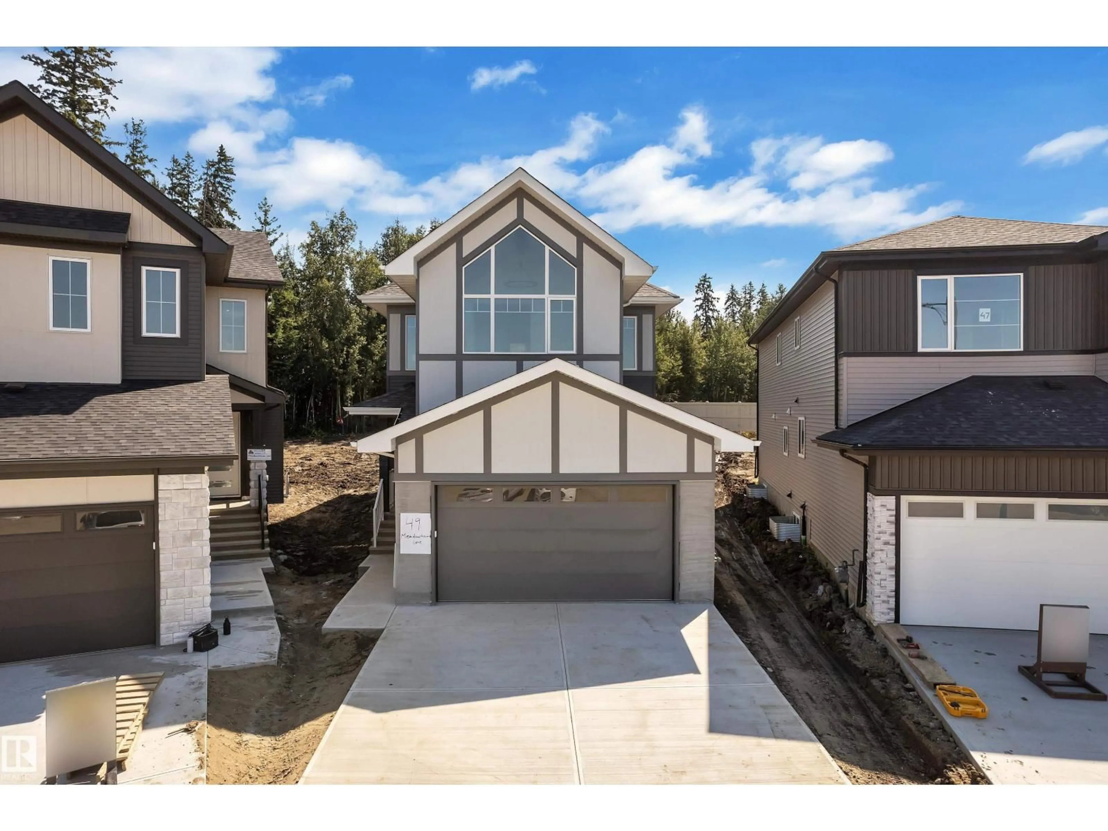 A pic from outside/outdoor area/front of a property/back of a property/a pic from drone, street for 49 MEADOWGROVE LANE, Spruce Grove Alberta T7X0W2
