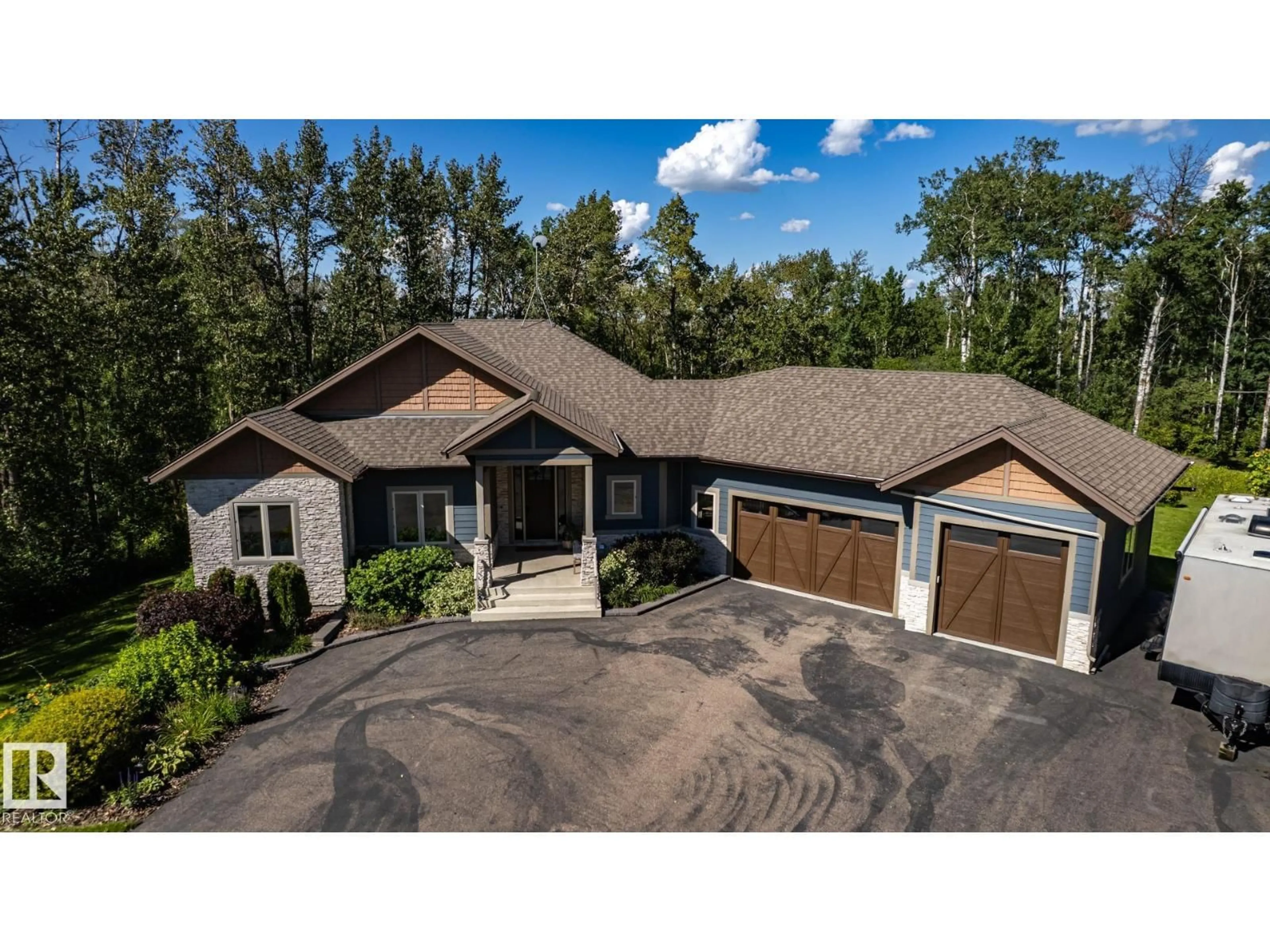 A pic from outside/outdoor area/front of a property/back of a property/a pic from drone, unknown for 120 50535 RGE RD 233, Rural Leduc County Alberta T4X0L4