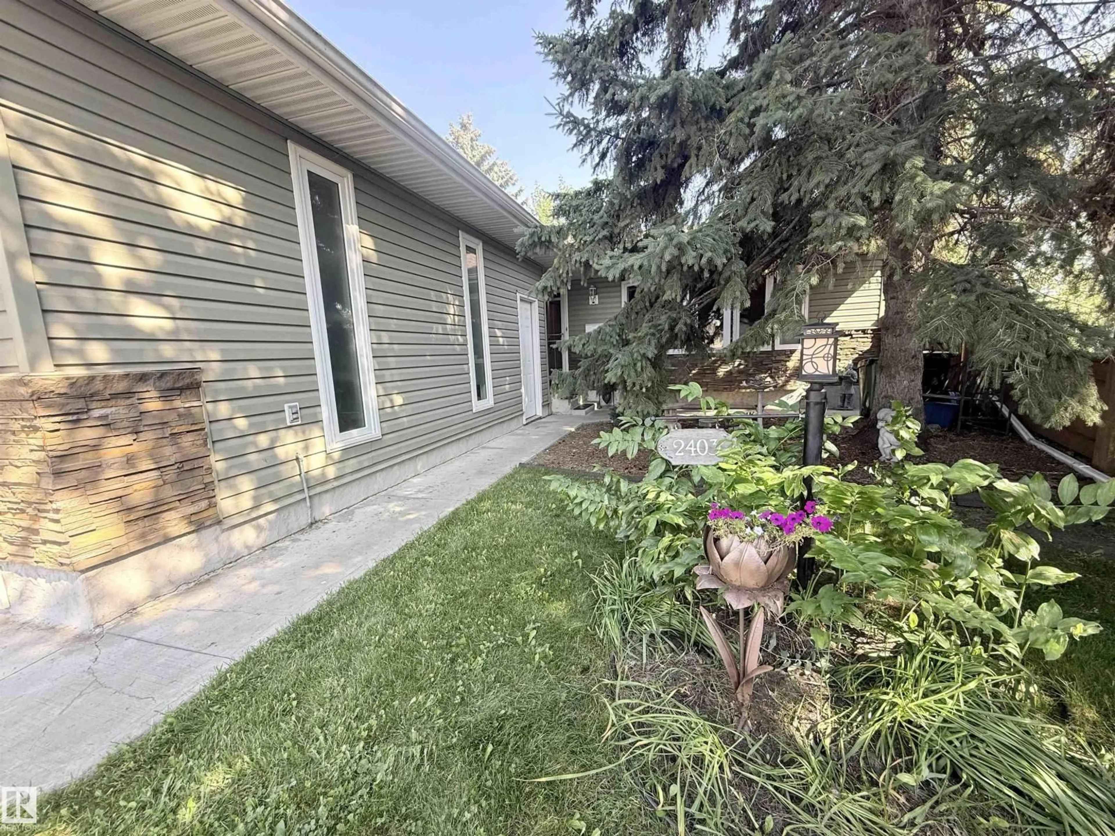 Patio, street for 2403 81 ST, Edmonton Alberta T6K3L5