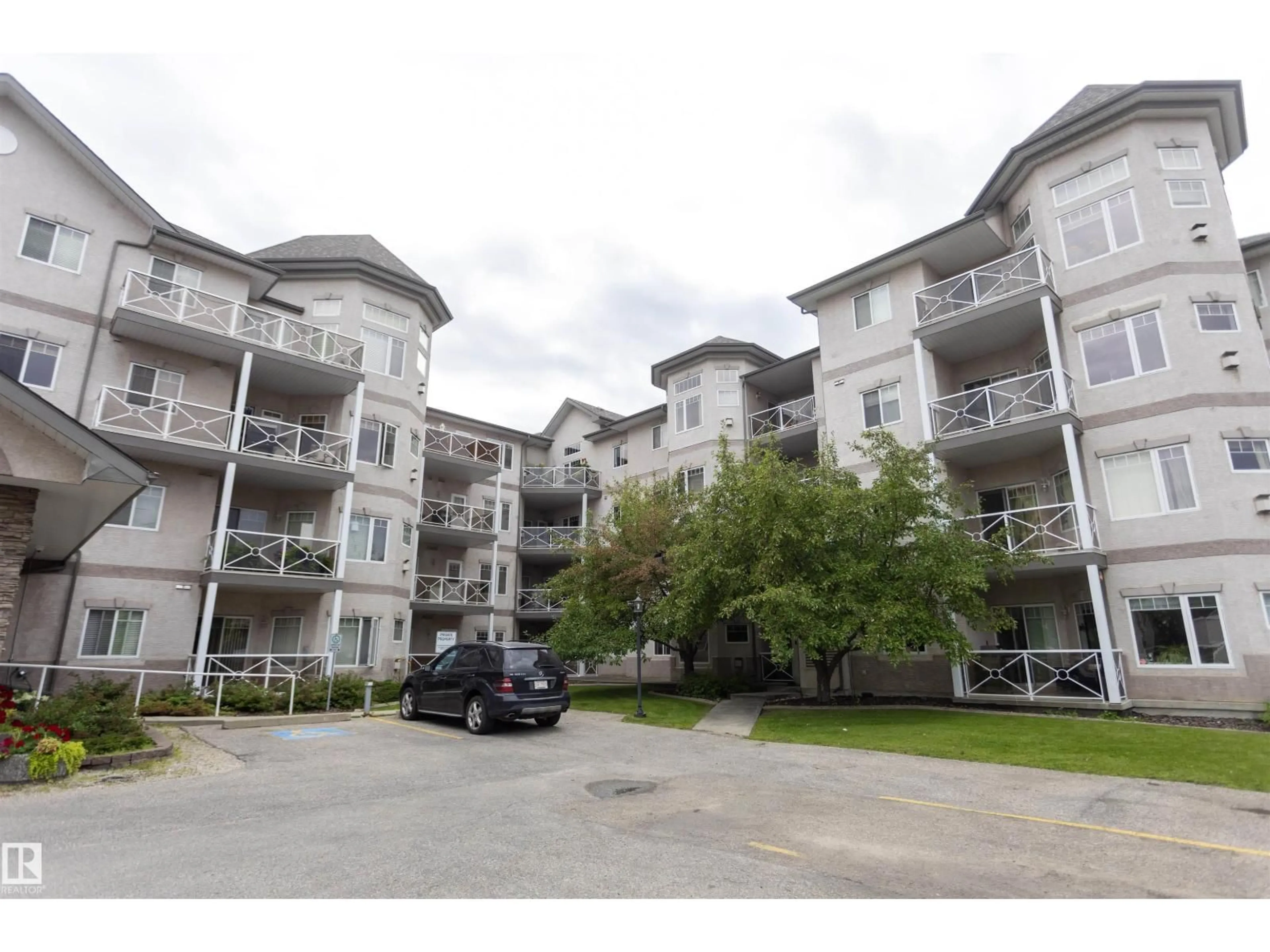 A pic from outside/outdoor area/front of a property/back of a property/a pic from drone, unknown for #204 - 2420 108 ST NW, Edmonton Alberta T6J7J3