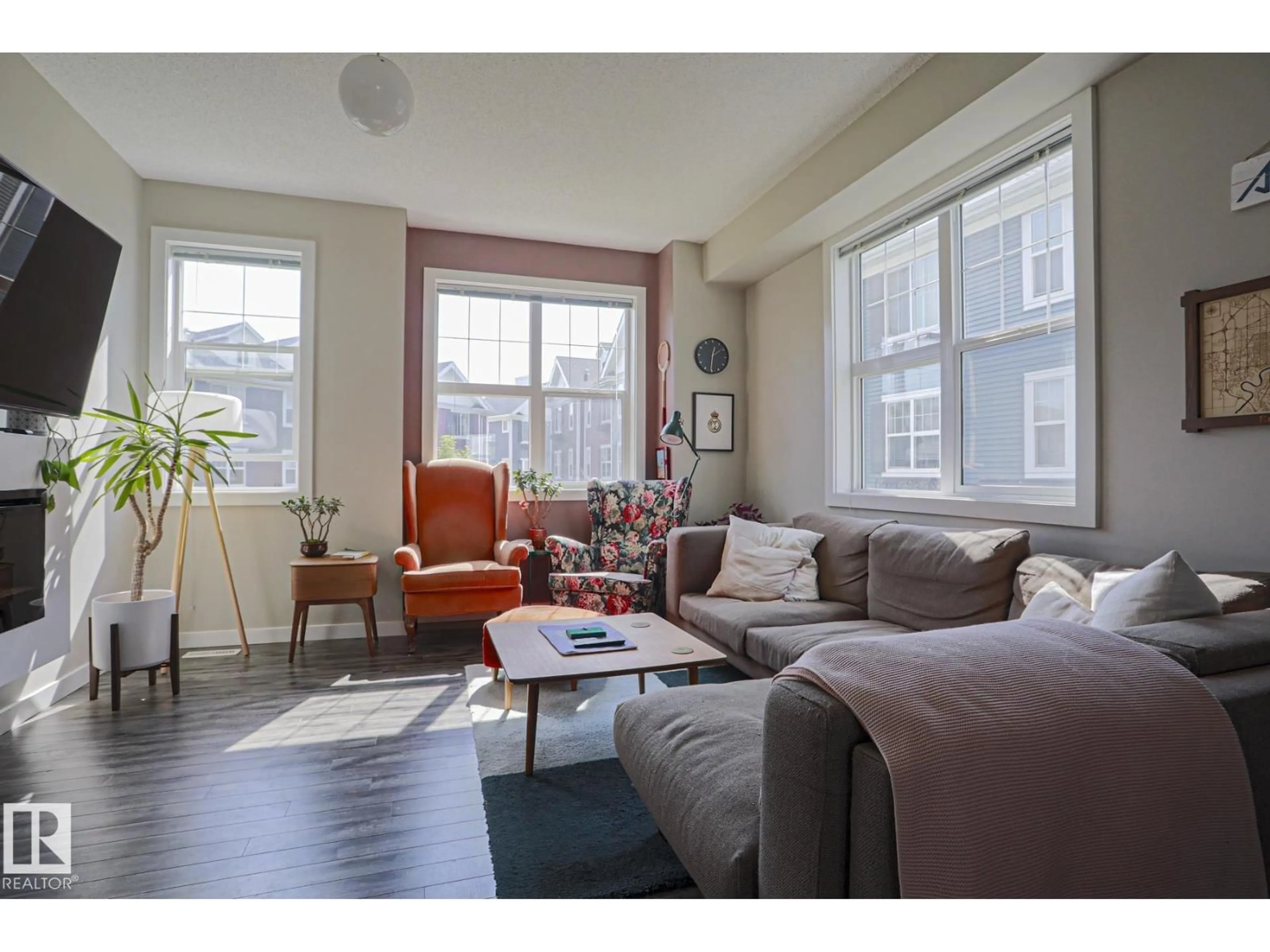 Living room with furniture, unknown for #88 - 2803 JAMES MOWATT TR, Edmonton Alberta T6W2P5