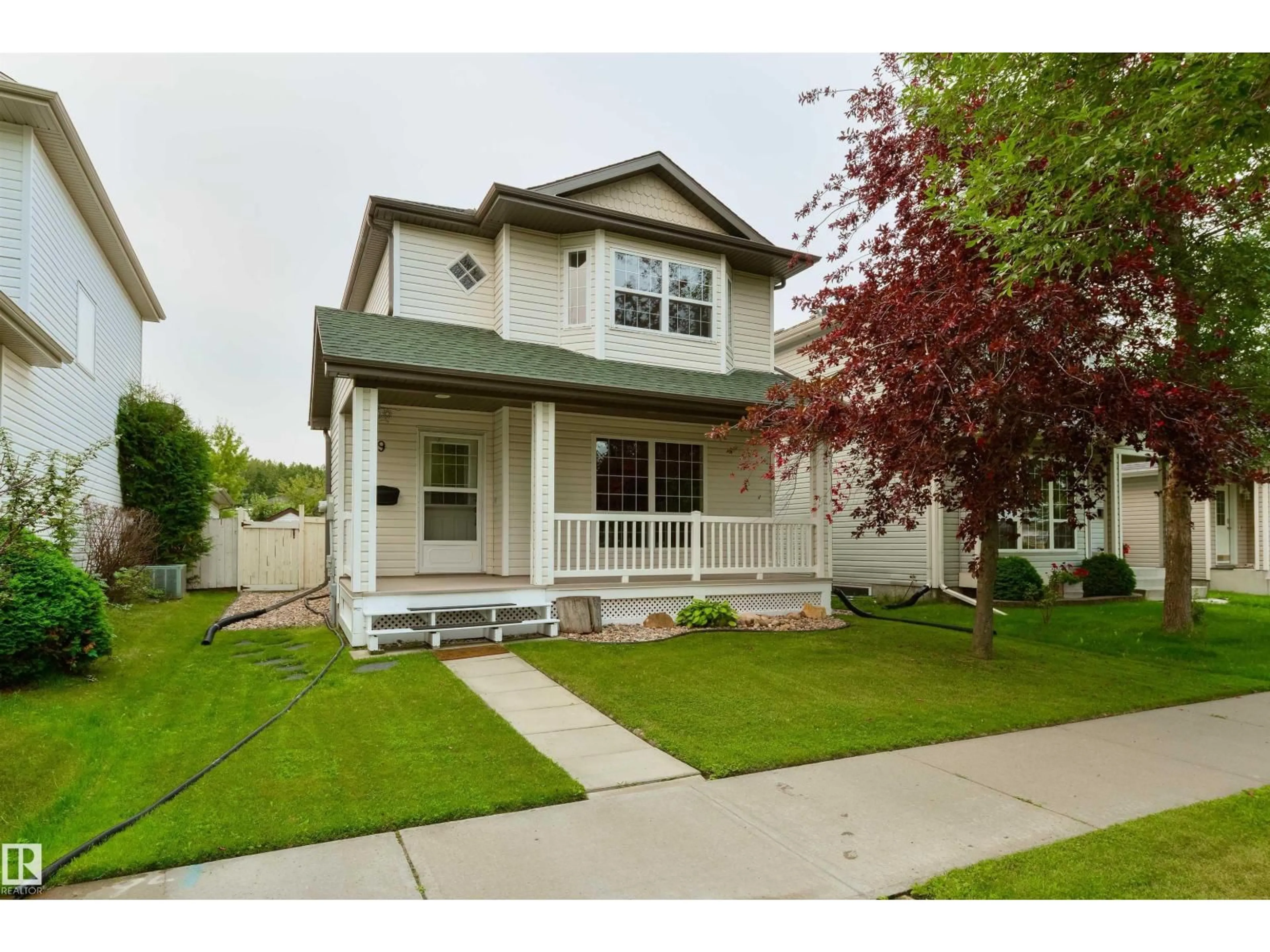 Home with vinyl exterior material, street for 9 HIGHWOOD BV, Devon Alberta T9G2E7