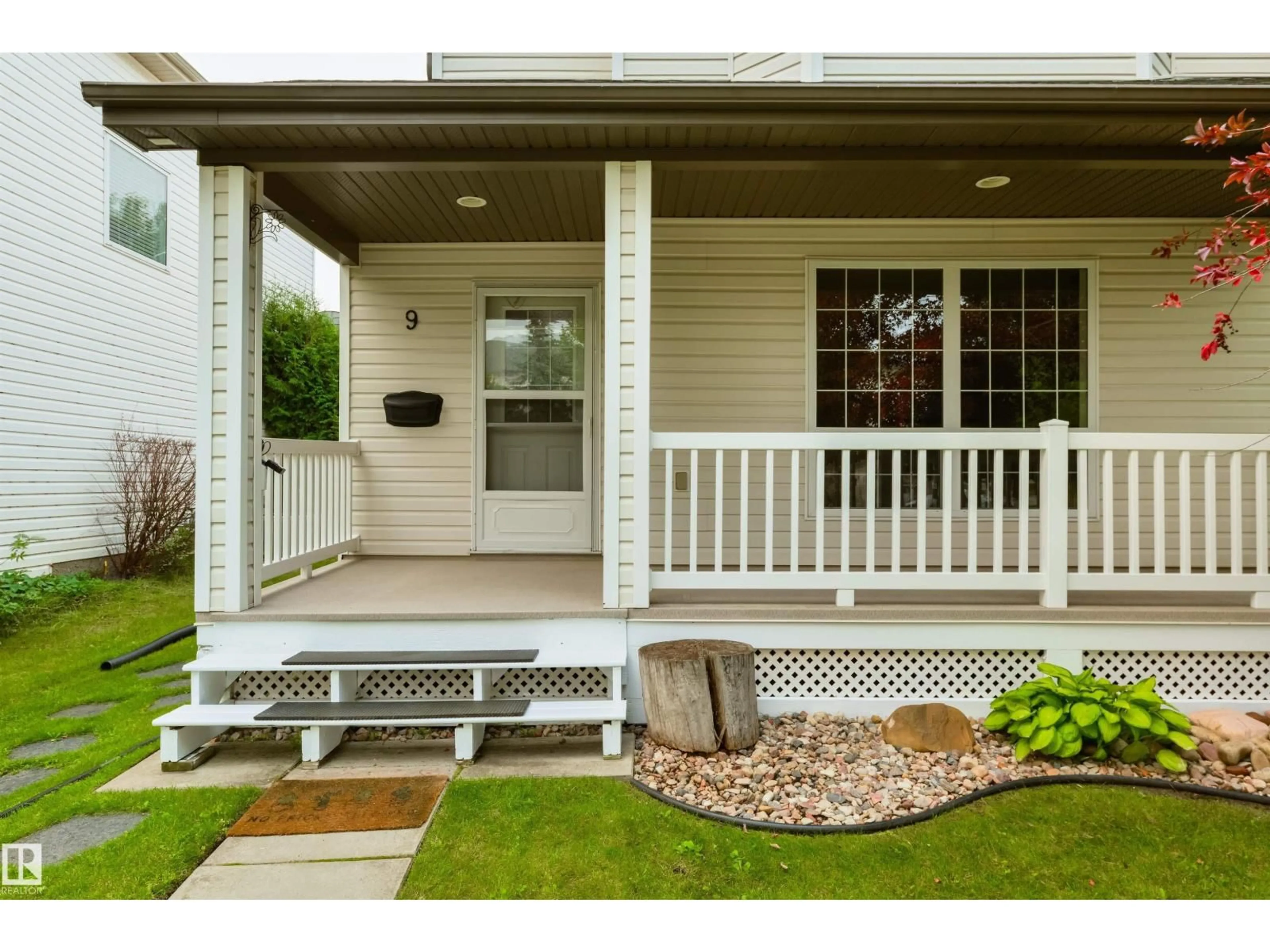 Home with vinyl exterior material, street for 9 HIGHWOOD BV, Devon Alberta T9G2E7