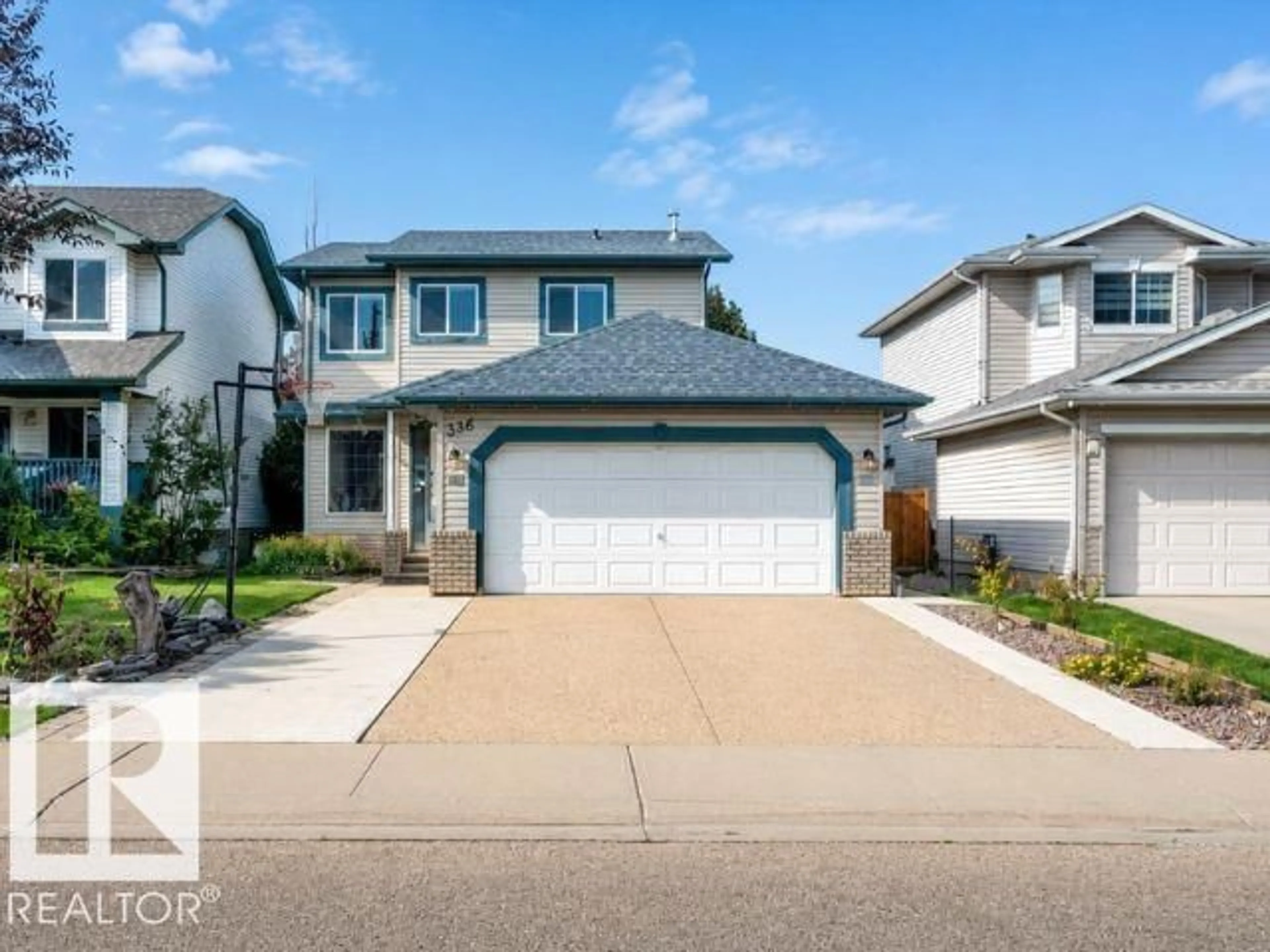 Home with vinyl exterior material, street for 336 WILD ROSE WY, Edmonton Alberta T6T1P3