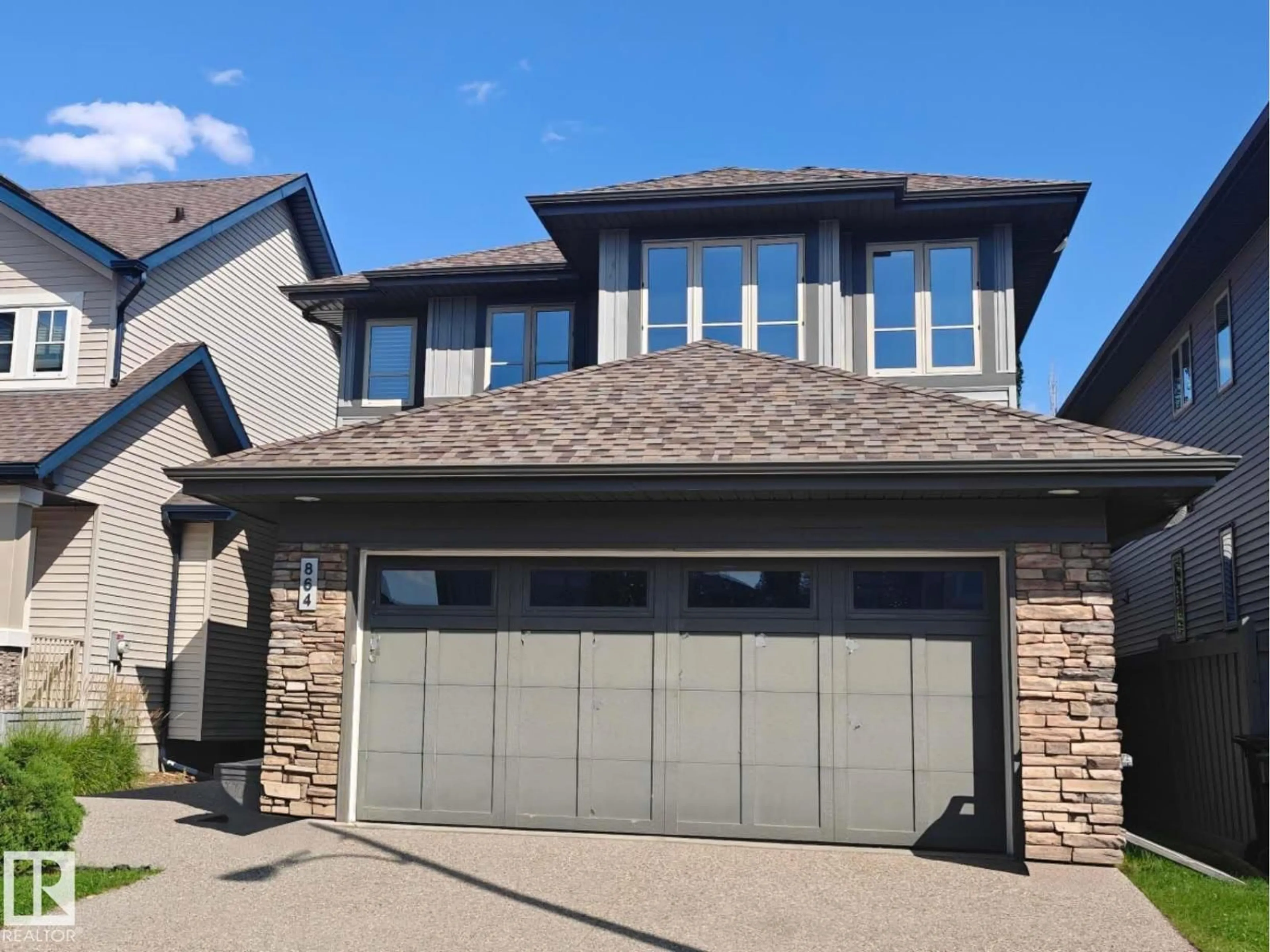 Home with brick exterior material, street for SW - 864 ARMITAGE WD, Edmonton Alberta T6W0K4