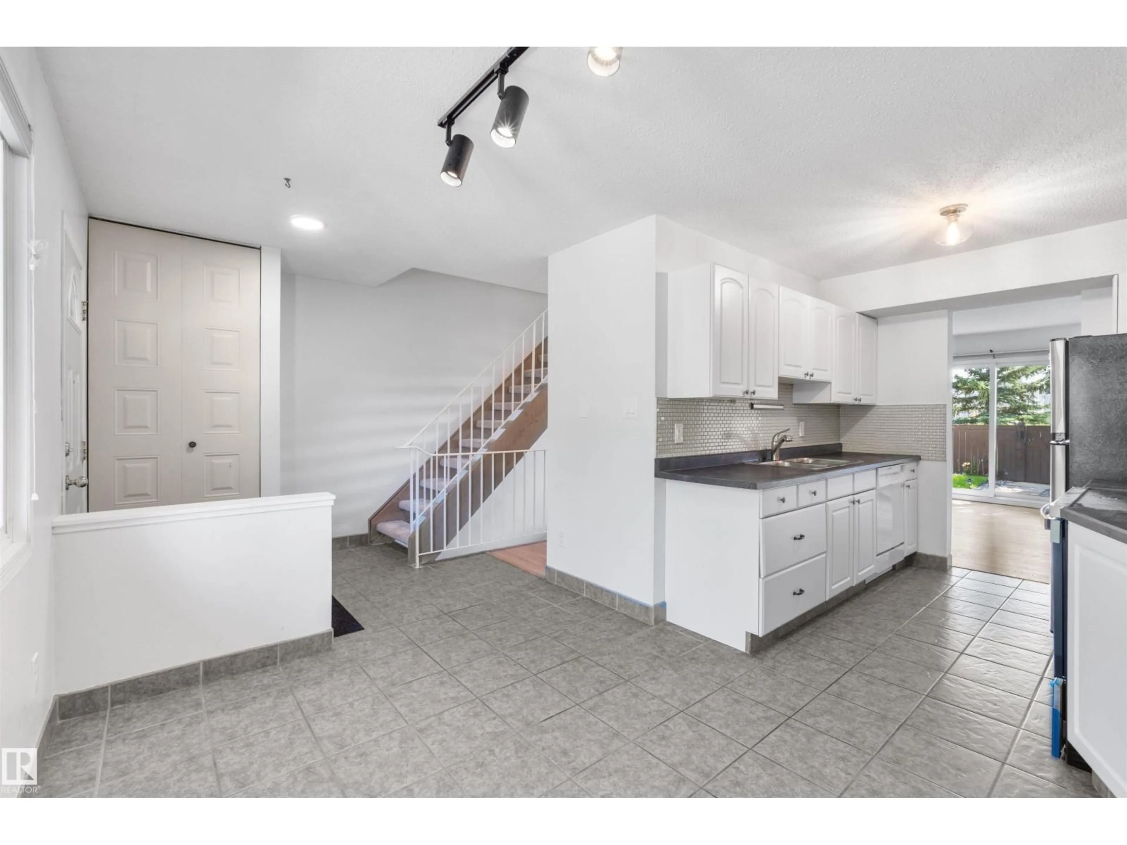 Open concept kitchen, ceramic/tile floor for 117 TUDOR LANE, Edmonton Alberta T6J3T5