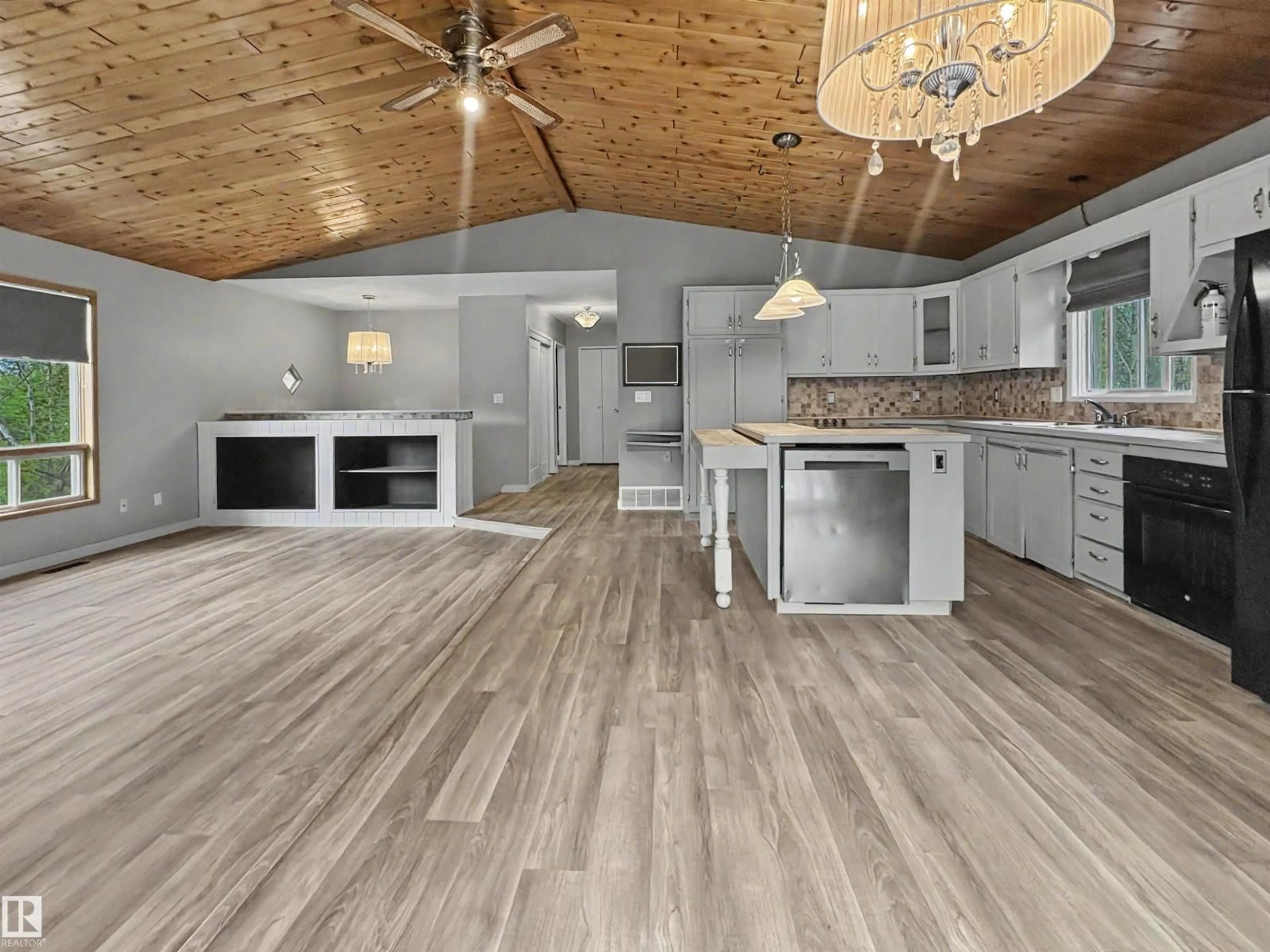 Open concept kitchen, wood/laminate floor for 61209 - 437 RGE RD 465, Rural Bonnyville M.D. Alberta T9N2J6
