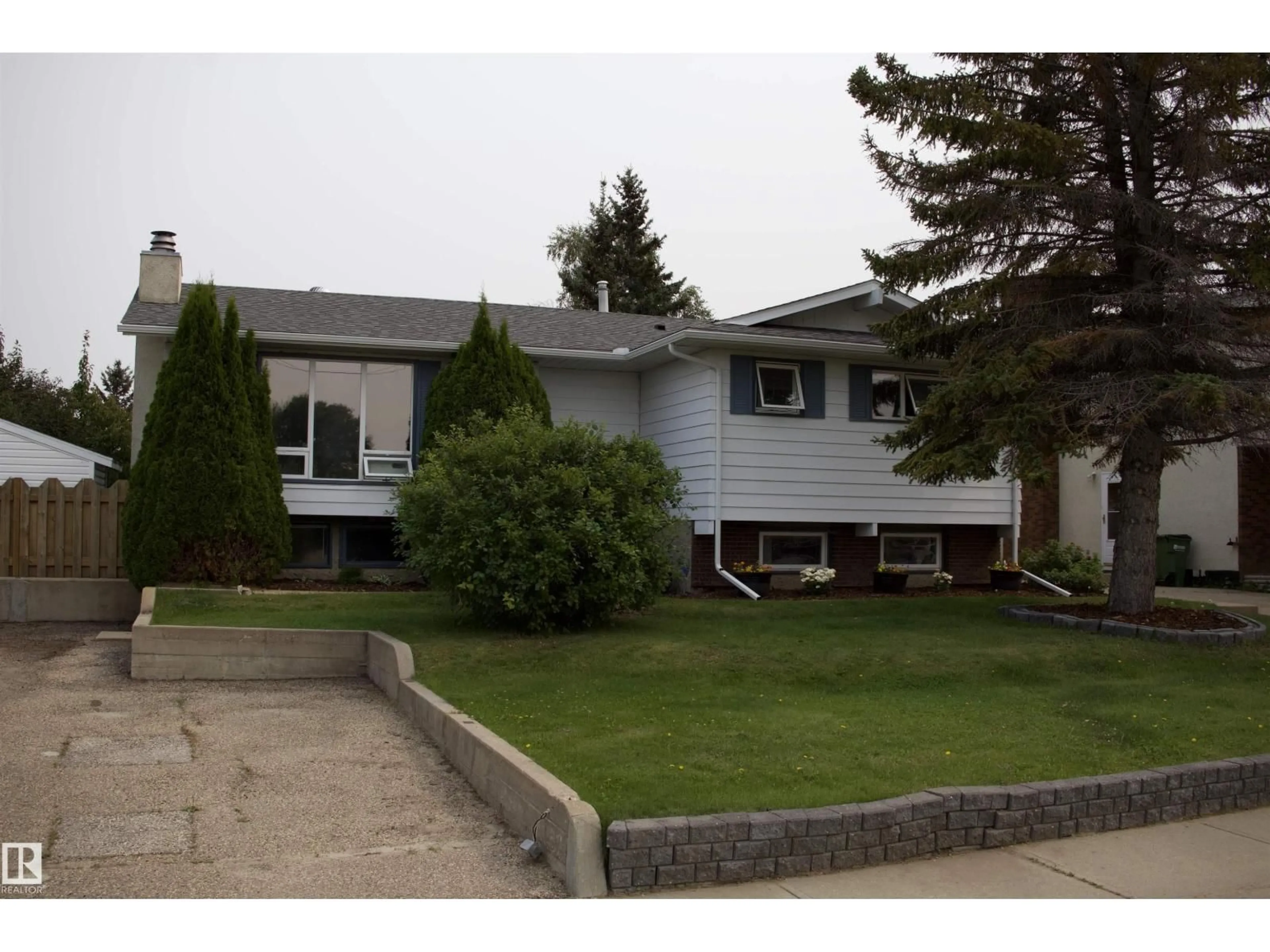 Home with vinyl exterior material, street for 10707 108 AVE, Westlock Alberta T1P1C7