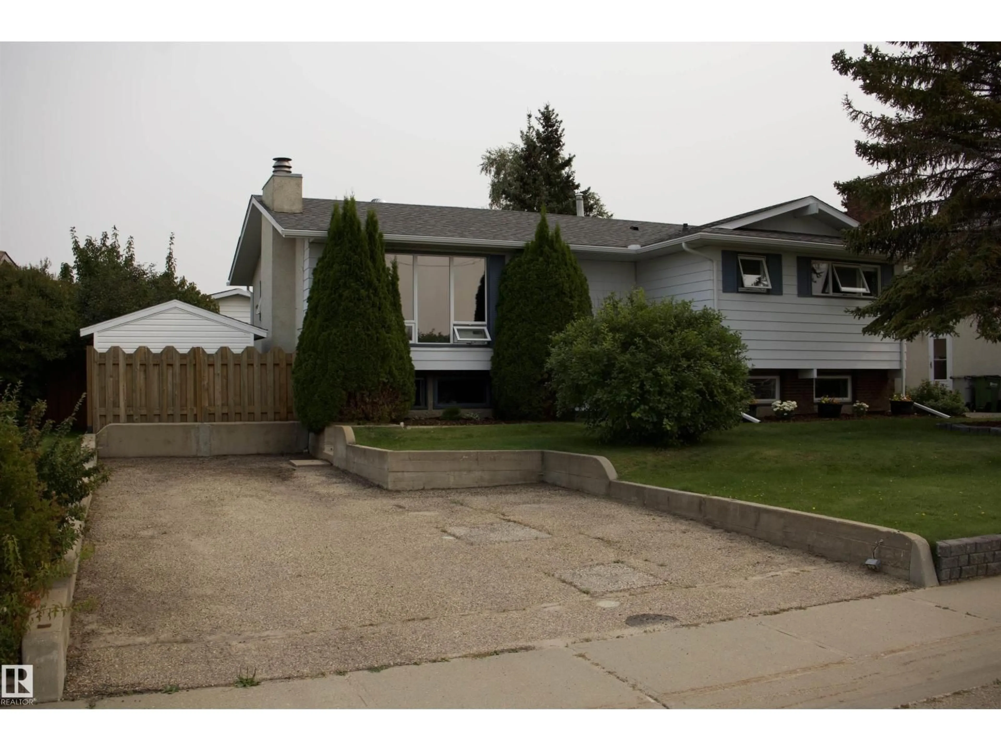 Home with vinyl exterior material, street for 10707 108 AVE, Westlock Alberta T1P1C7
