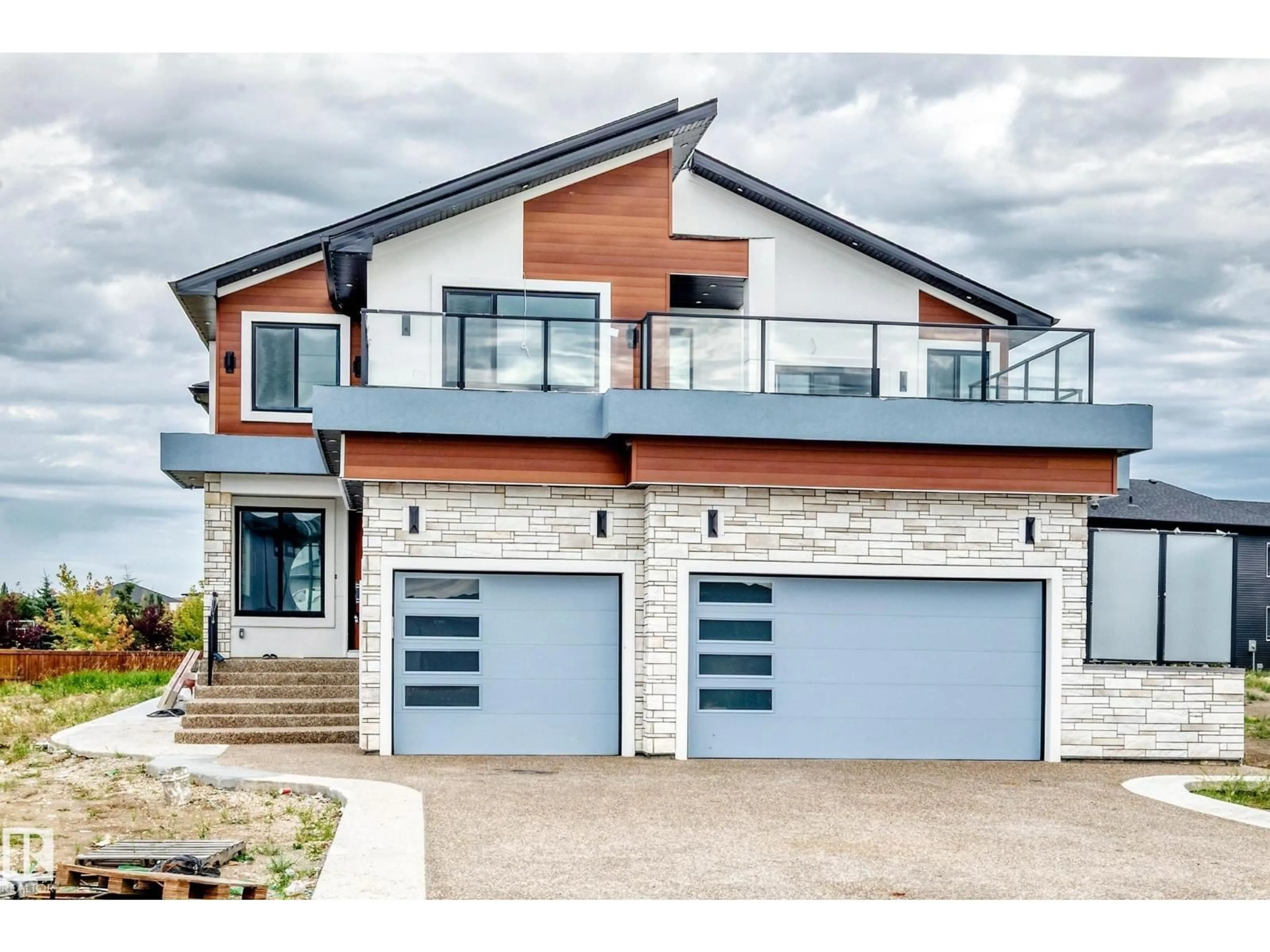 Home with brick exterior material, street for NE - 6111 27 ST, Rural Leduc County Alberta T0C2K0