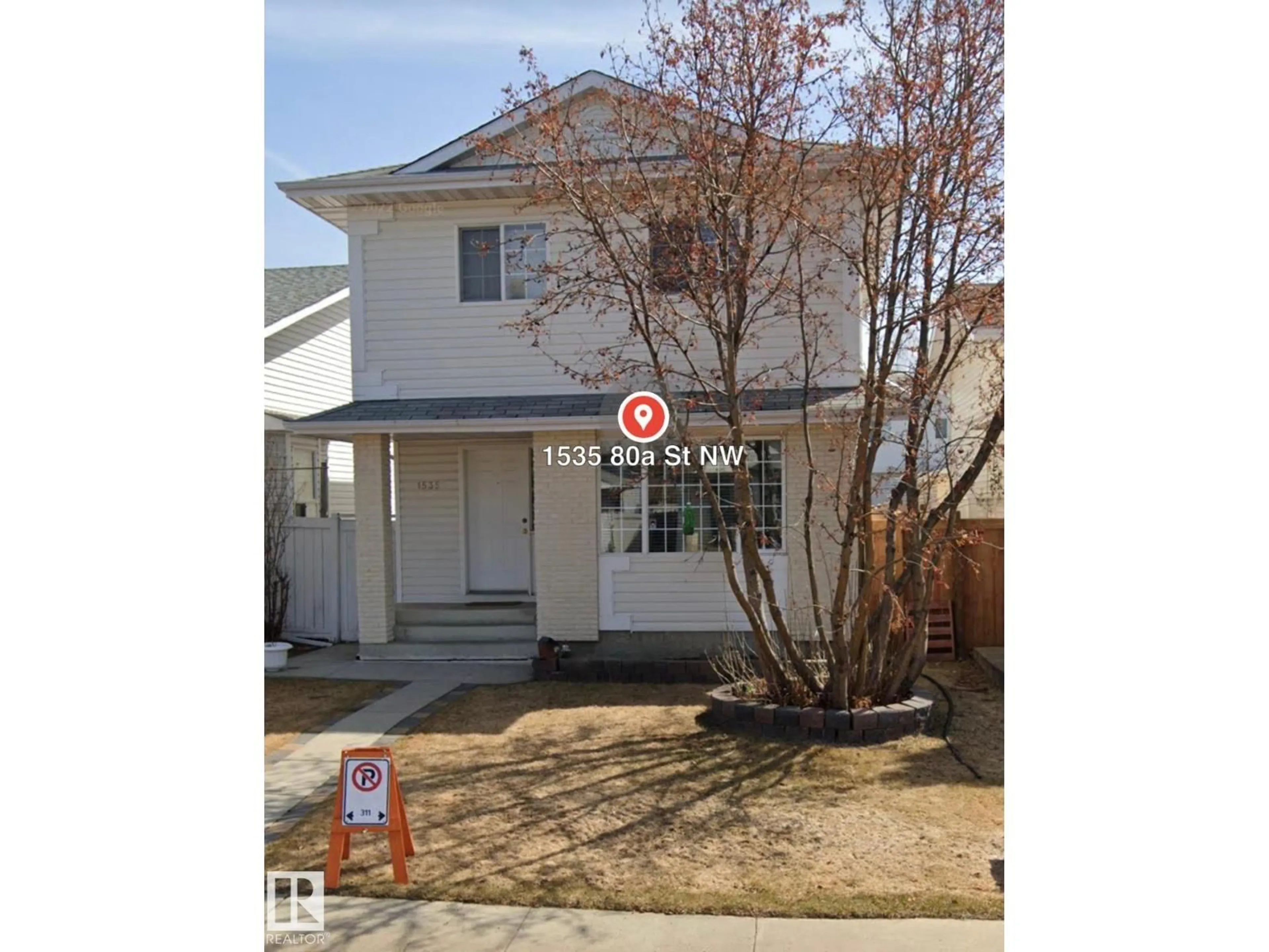Home with vinyl exterior material, street for NW - 1535 80A ST, Edmonton Alberta T6K4E2