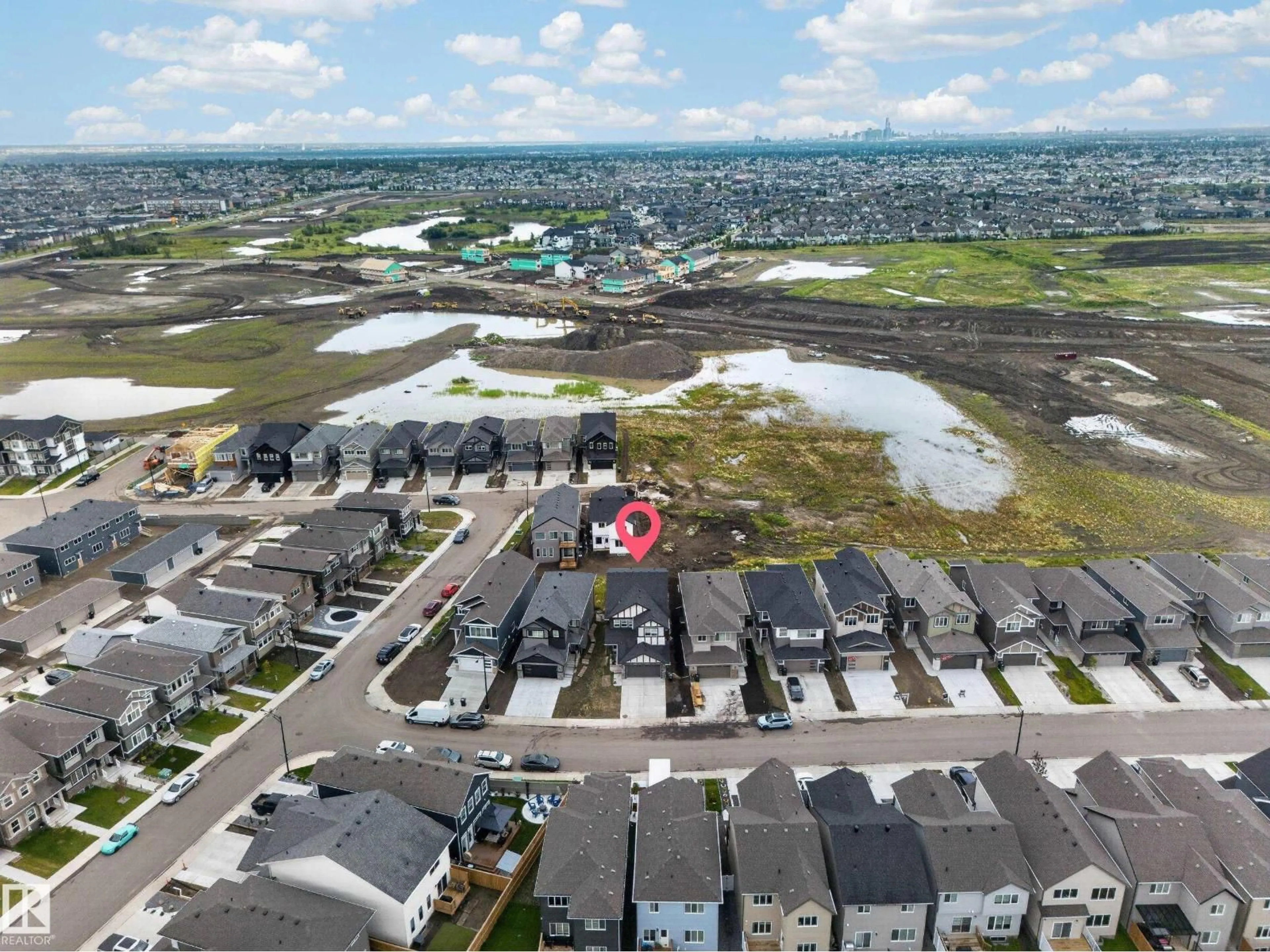 A pic from outside/outdoor area/front of a property/back of a property/a pic from drone, unknown for 7011 177 AV, Edmonton Alberta T5Z0W8
