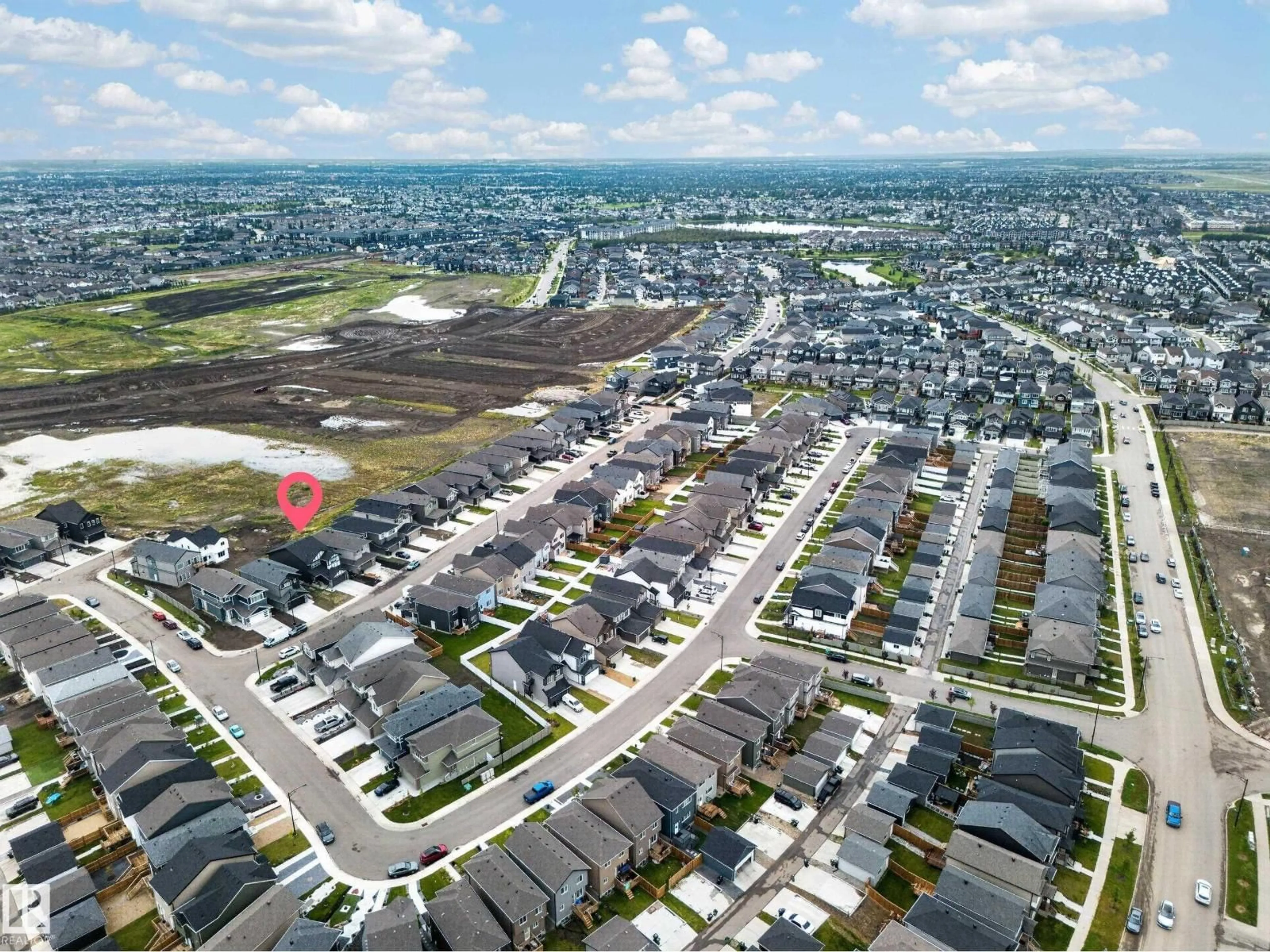A pic from outside/outdoor area/front of a property/back of a property/a pic from drone, street for 7011 177 AV, Edmonton Alberta T5Z0W8