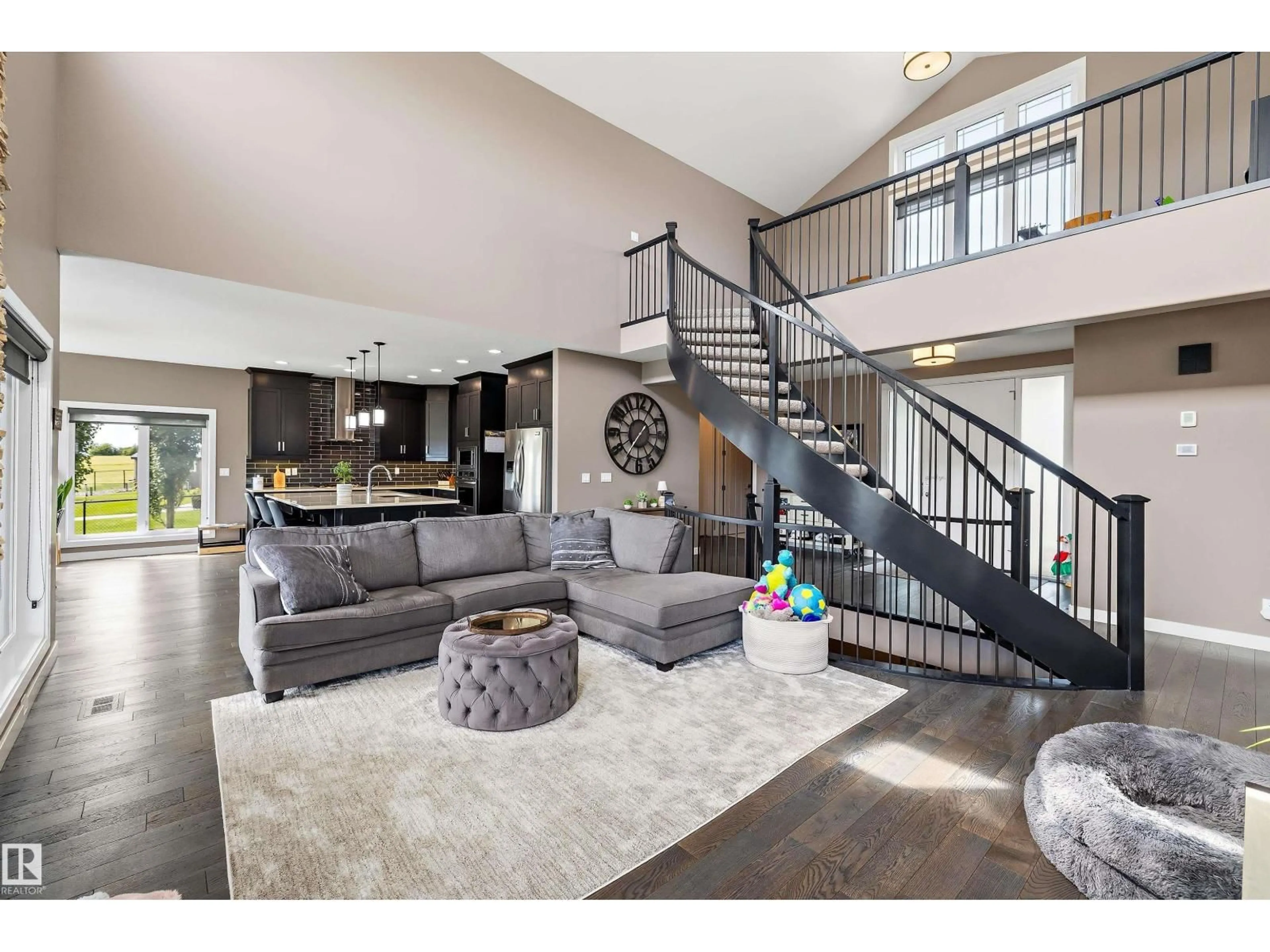 Living room with furniture, unknown for 207 - 54302 RGE ROAD 250, Rural Sturgeon County Alberta T8T0C9