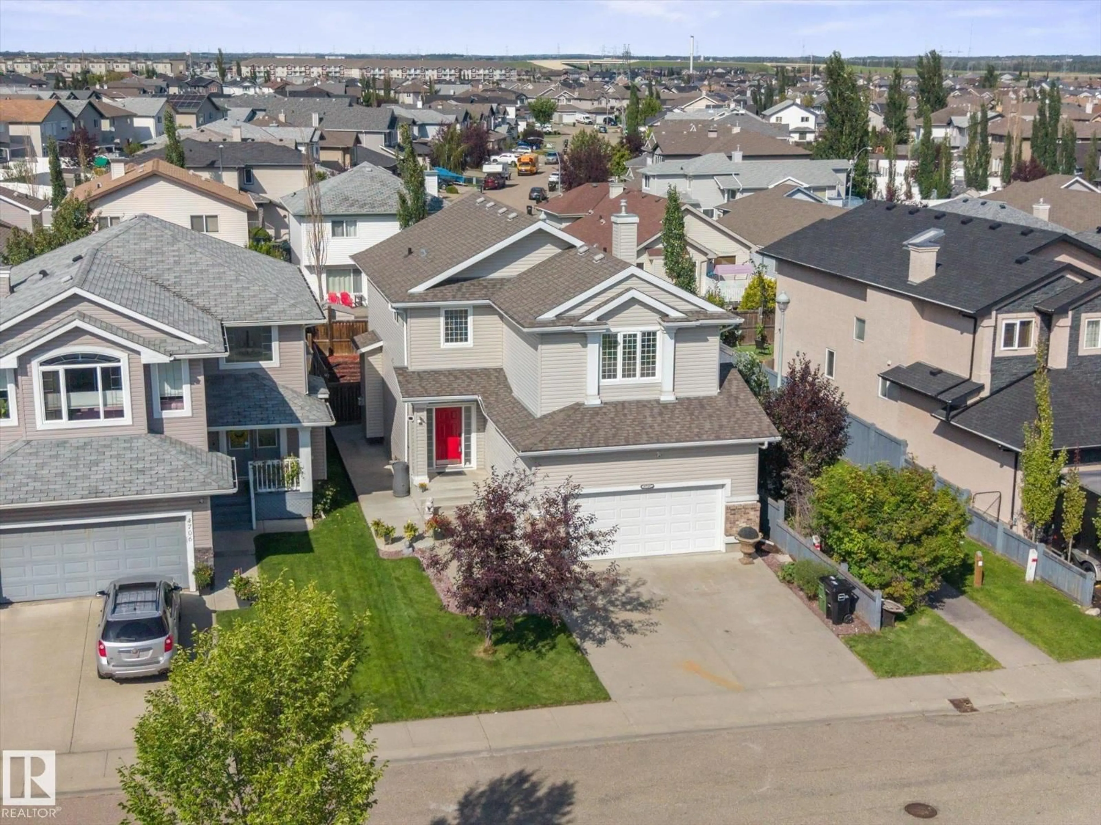 A pic from outside/outdoor area/front of a property/back of a property/a pic from drone, street for 4704 160 AV, Edmonton Alberta T5Y3M1