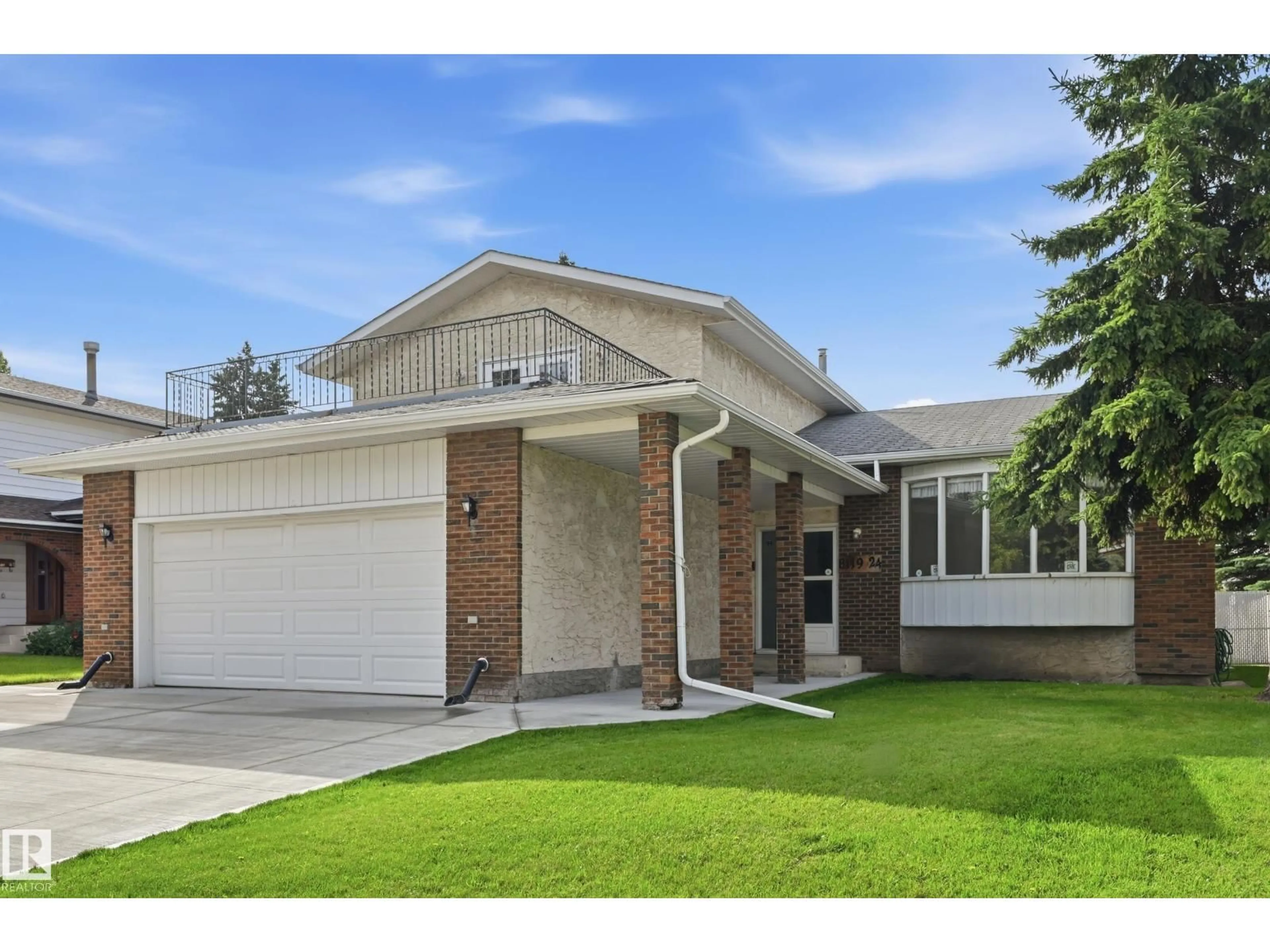 Home with brick exterior material, street for 8119 24 AV, Edmonton Alberta T6K2W2