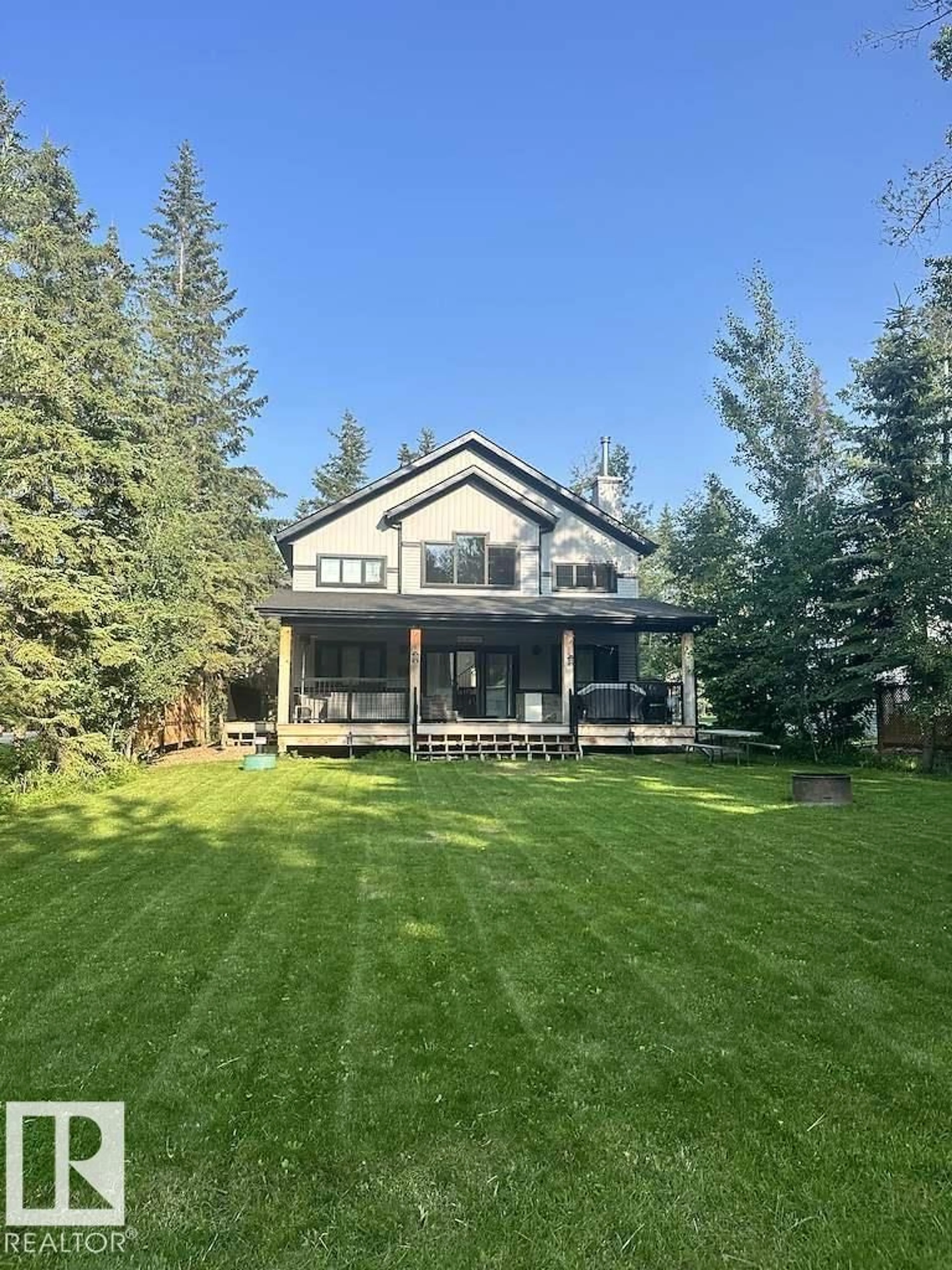 A pic from outside/outdoor area/front of a property/back of a property/a pic from drone, mountain view for 801 8 ST, Rural Lac Ste. Anne County Alberta T0E0A2