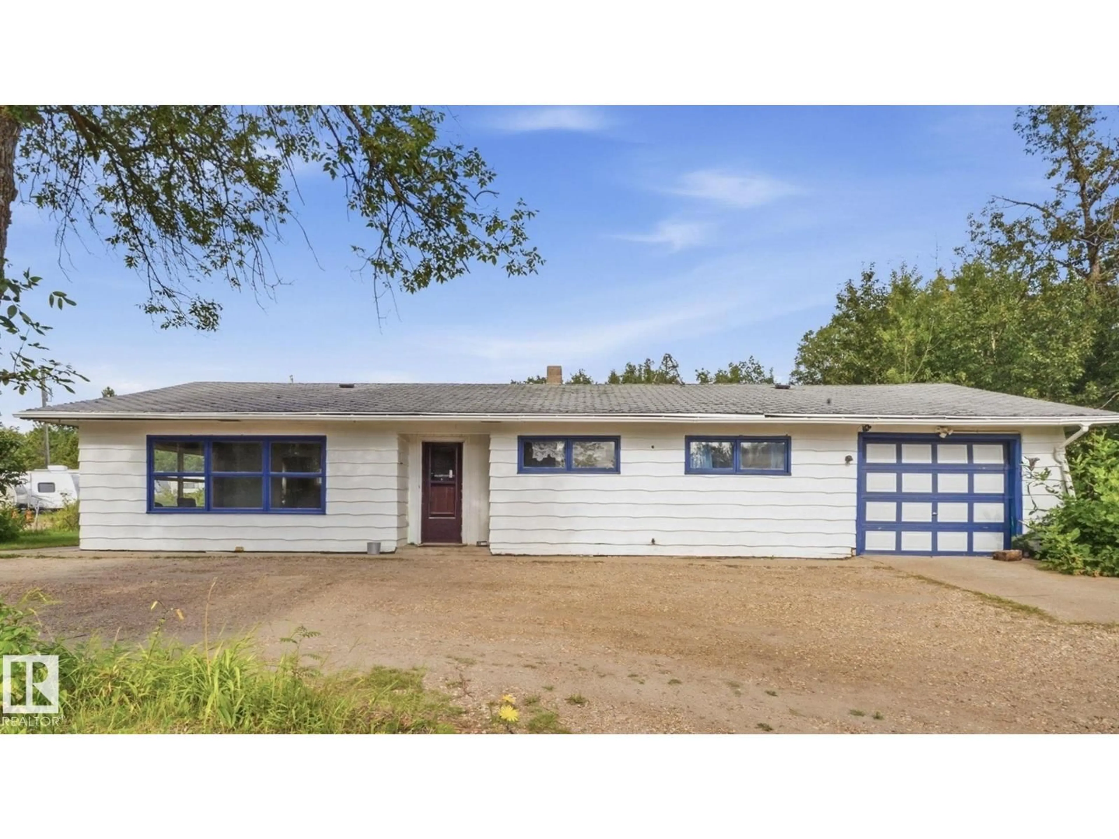 Home with vinyl exterior material, street for 52012 HWY 21, Rural Strathcona County Alberta T8B1J6