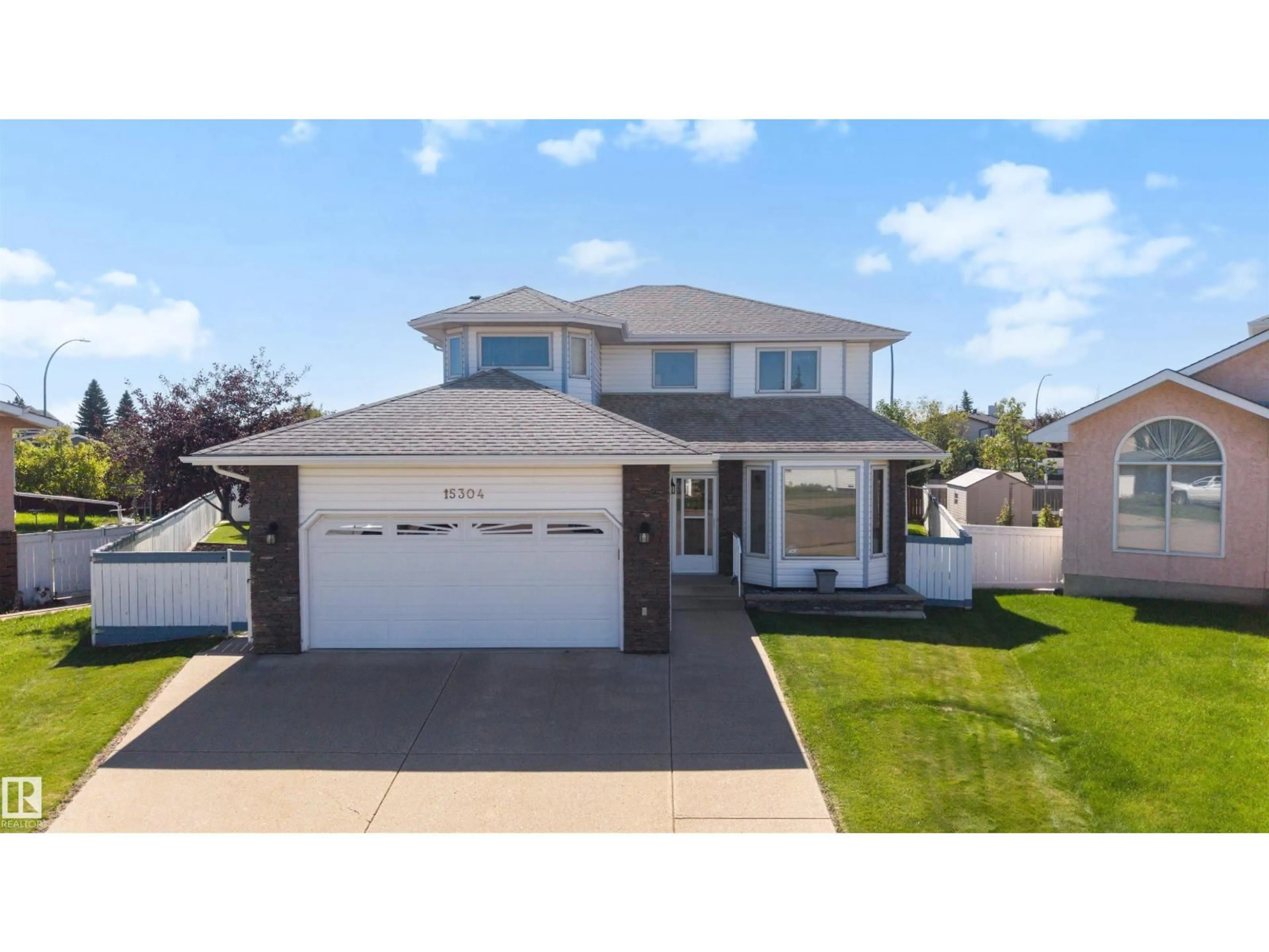 Home with vinyl exterior material, street for 15304 74 ST, Edmonton Alberta T5Z2X8