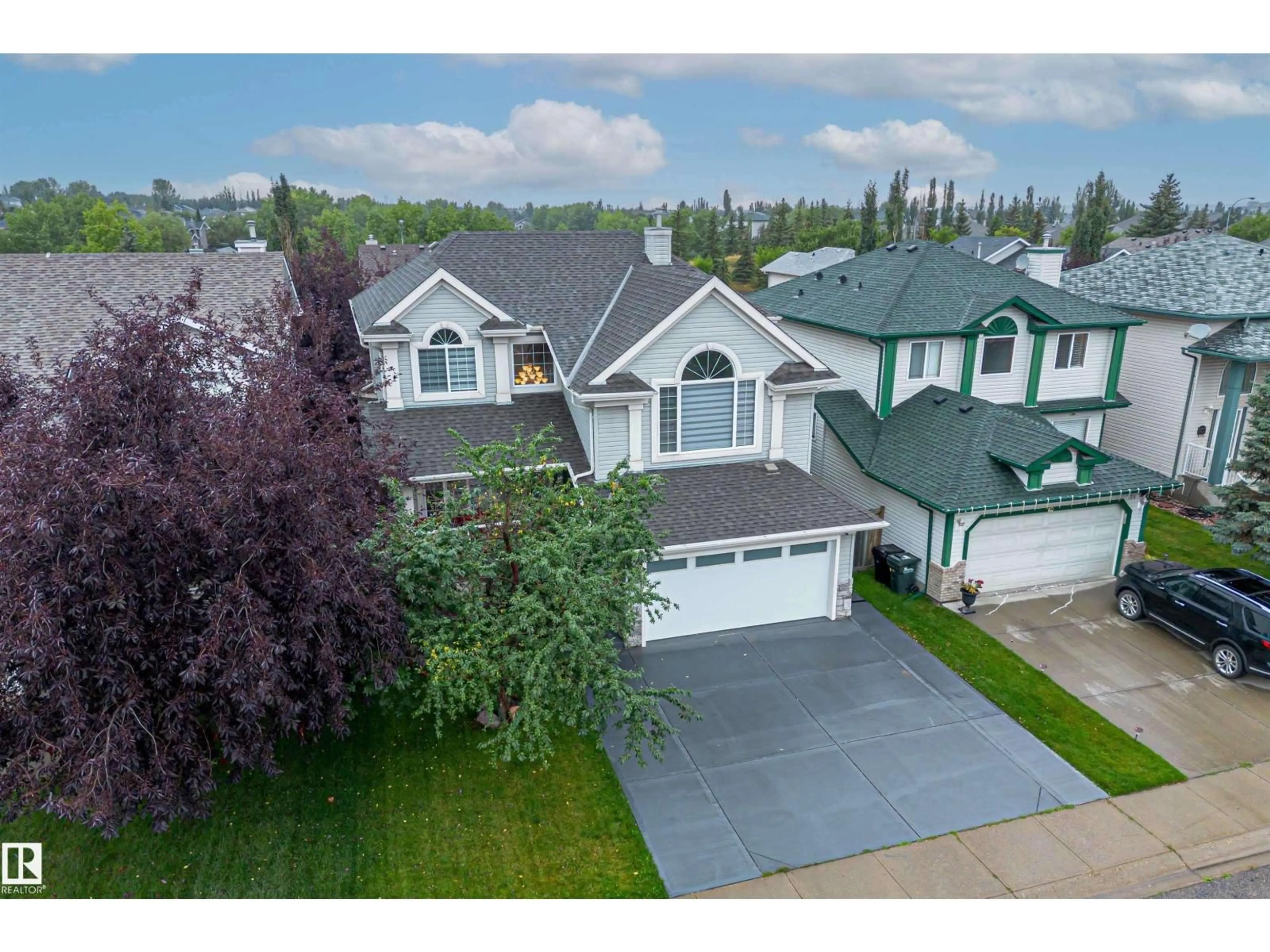 A pic from outside/outdoor area/front of a property/back of a property/a pic from drone, street for 126 ORCHID CR, Sherwood Park Alberta T8H2E2