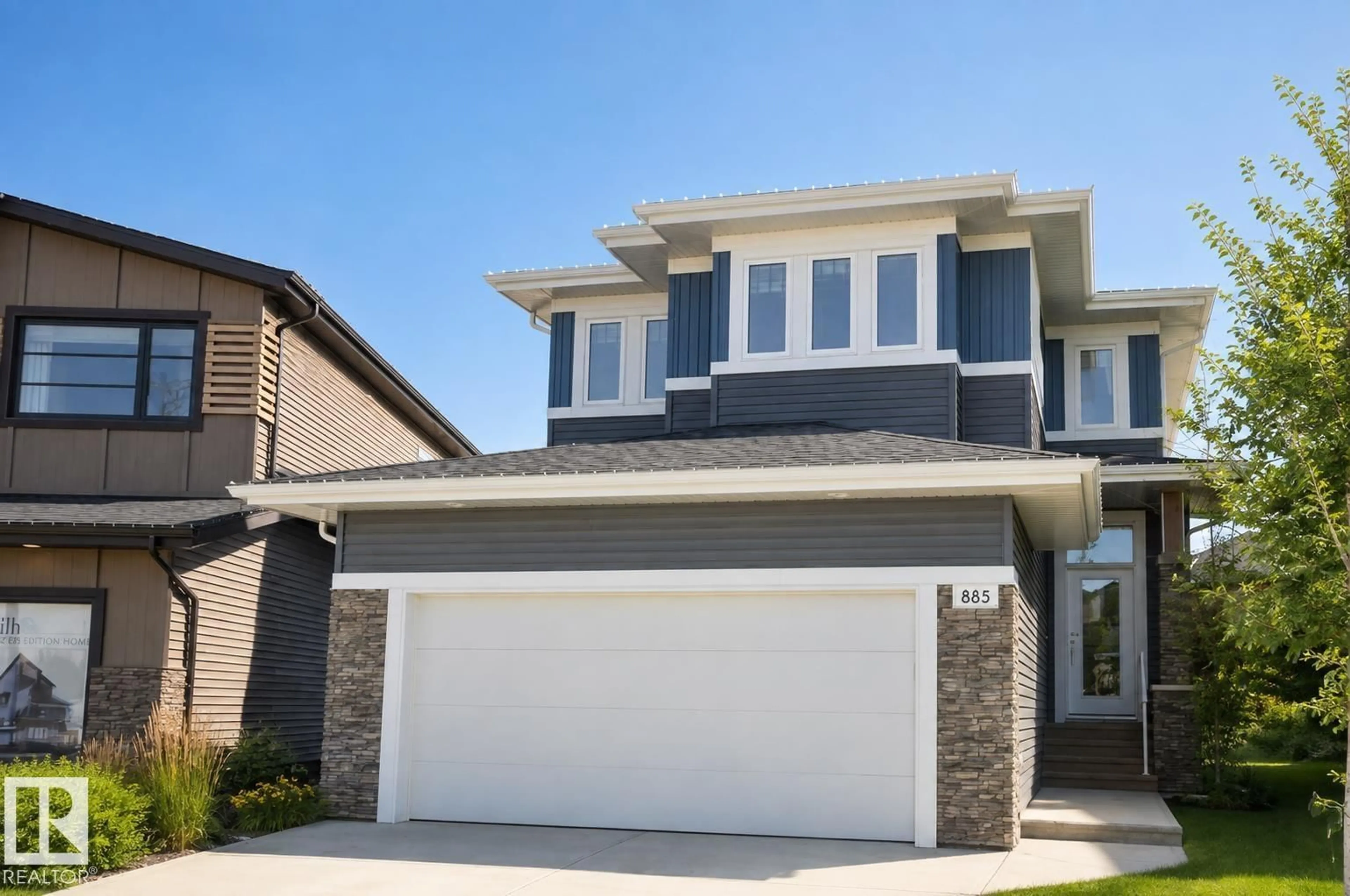 Home with vinyl exterior material, street for 885 WINDERMERE WD, Edmonton Alberta T6W2M6