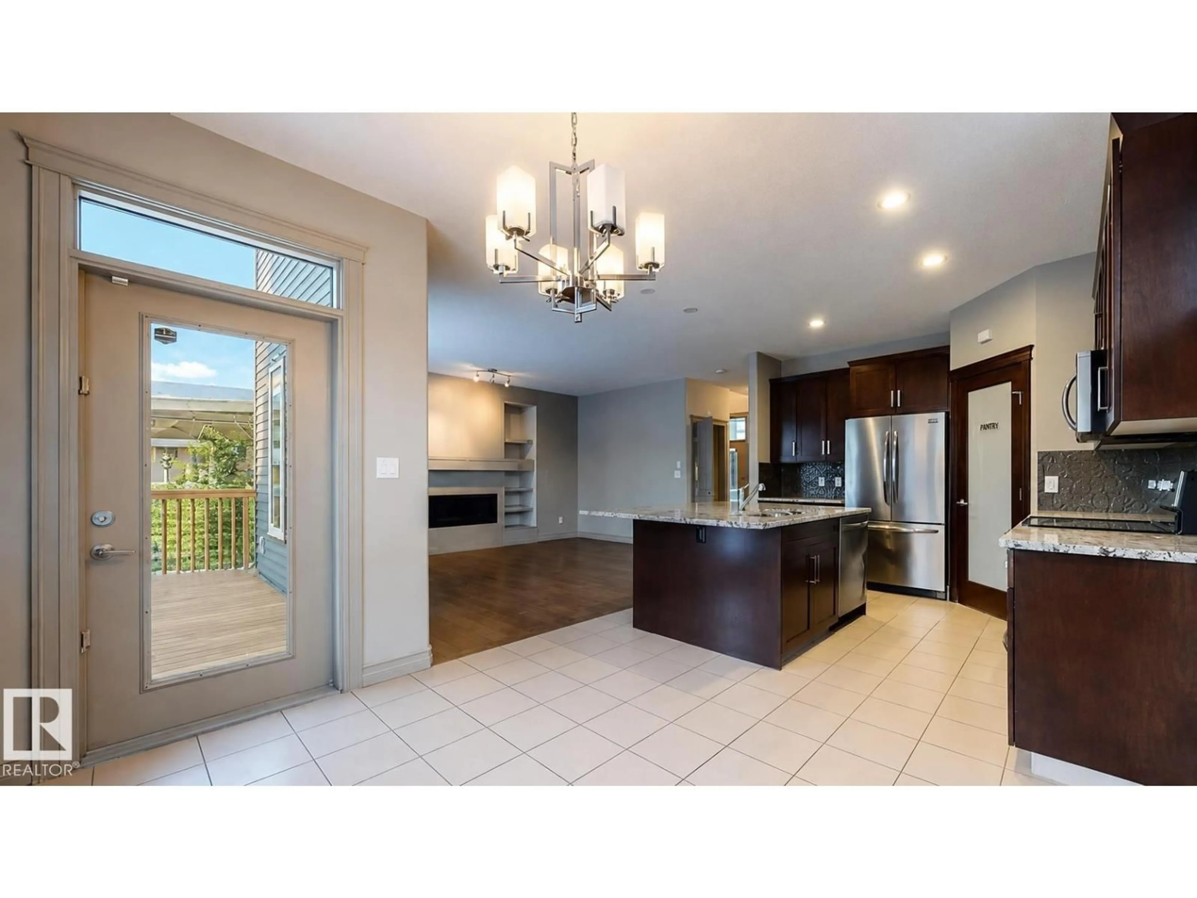 Open concept kitchen, ceramic/tile floor for 885 WINDERMERE WD, Edmonton Alberta T6W2M6