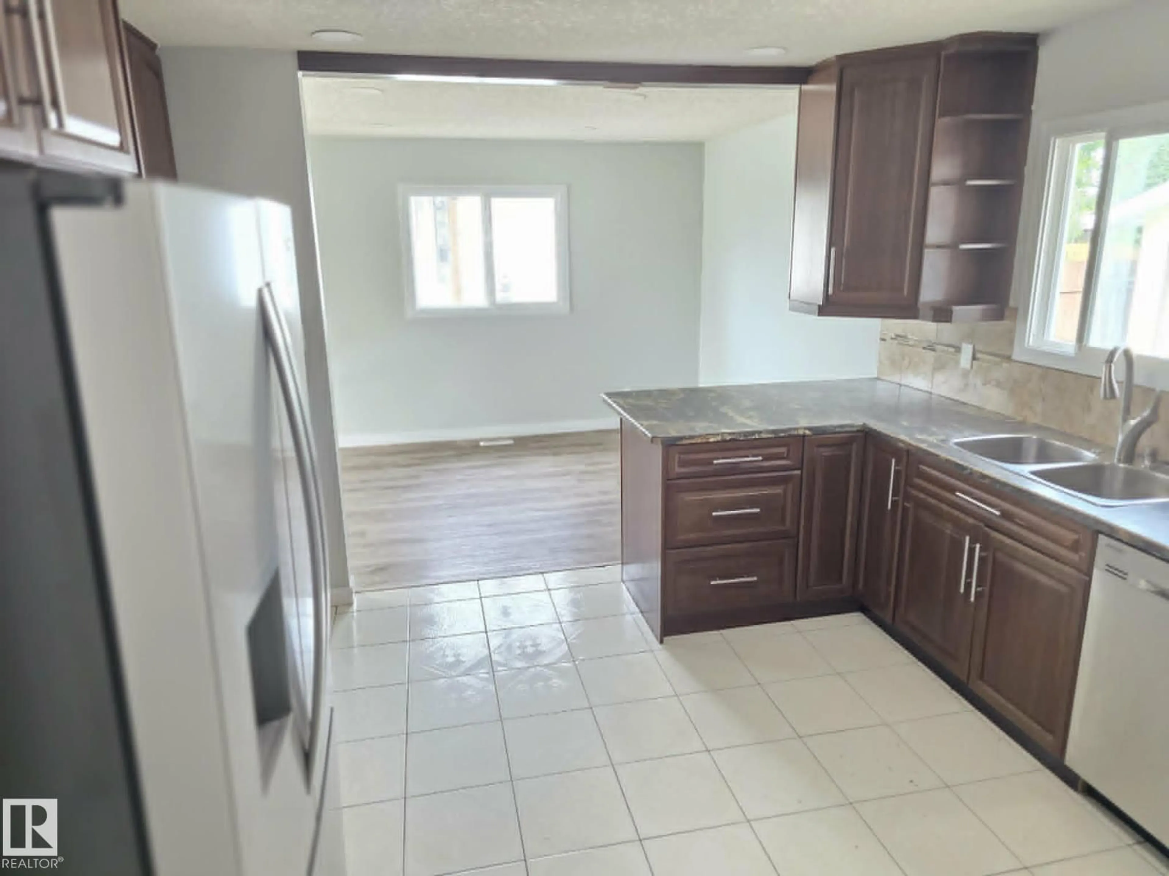 Standard kitchen, ceramic/tile floor for 12120 146 AV, Edmonton Alberta T5X1V3