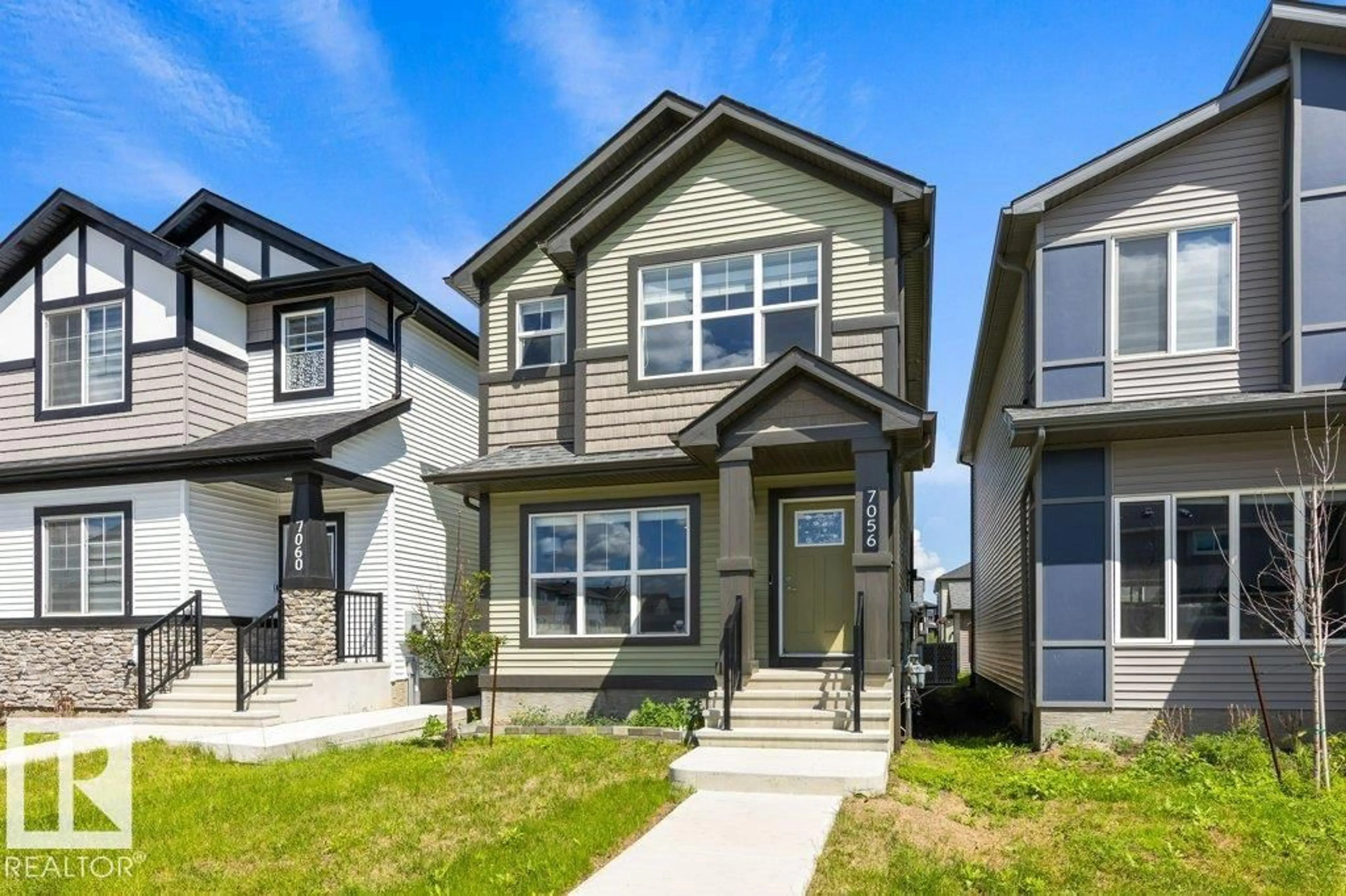 Home with vinyl exterior material, street for 7056 181 AV, Edmonton Alberta T5Z0V4