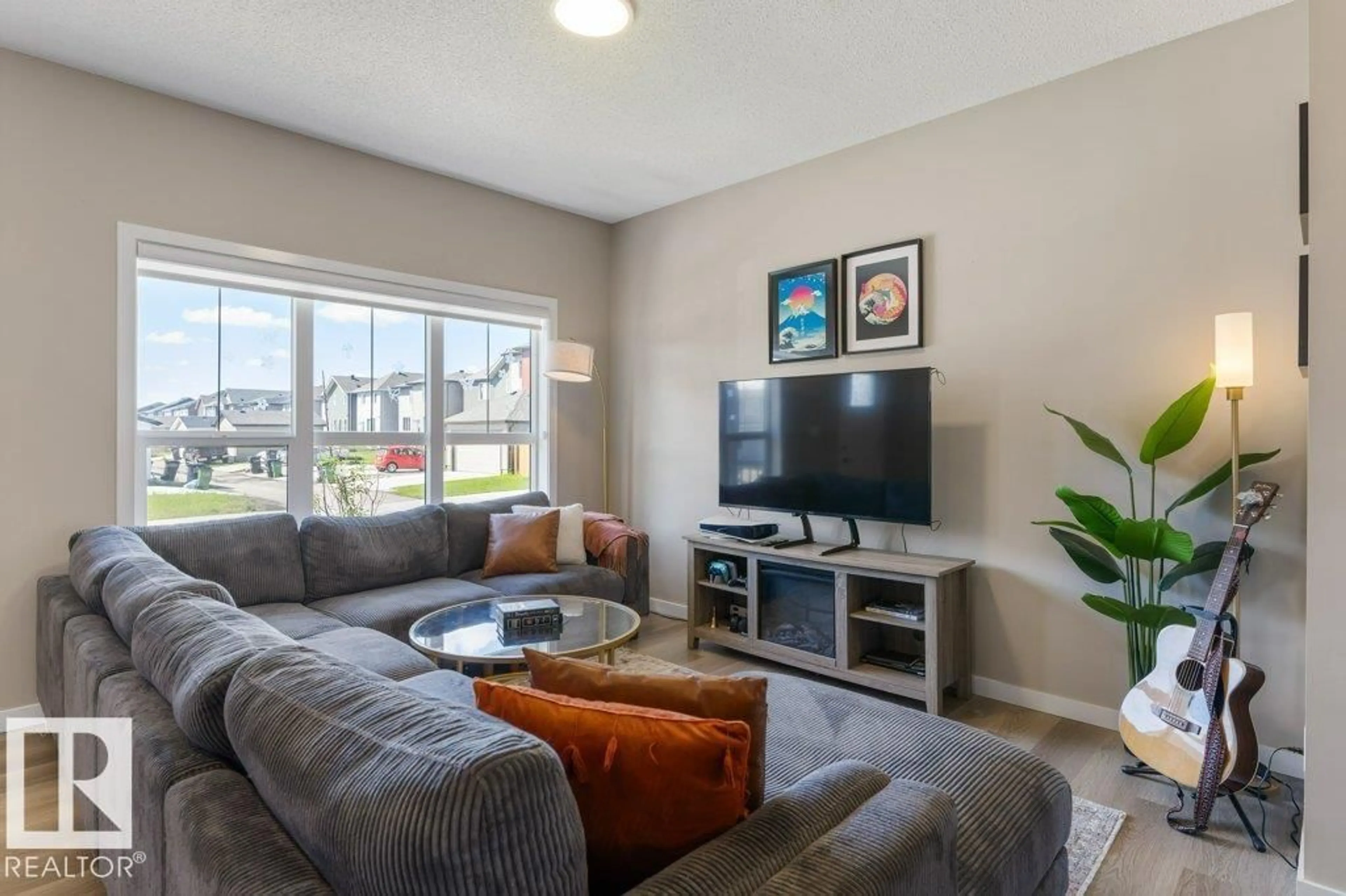 Living room with furniture, unknown for 7056 181 AV, Edmonton Alberta T5Z0V4