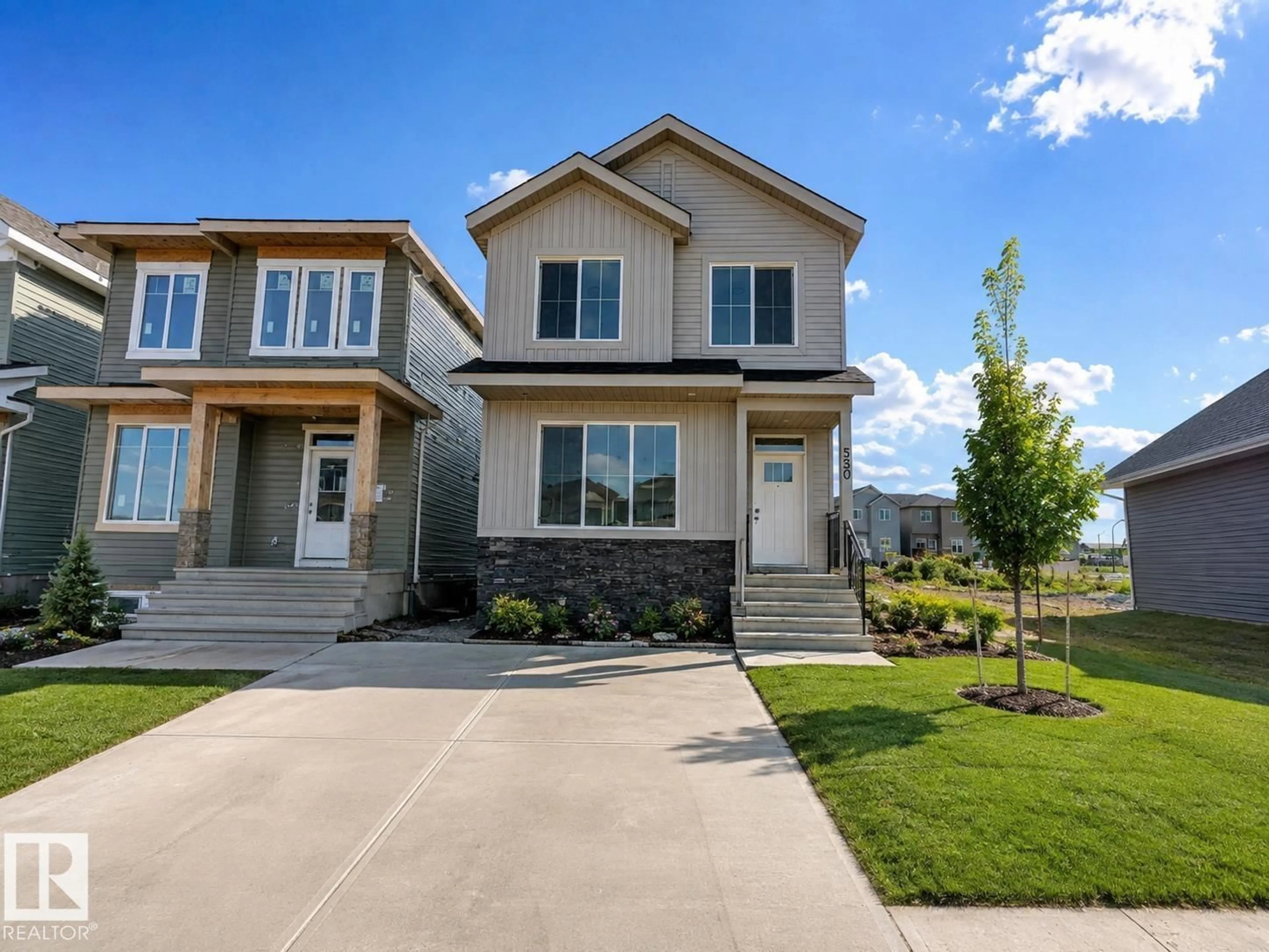 Home with vinyl exterior material, street for 554 ASHGROVE CIRCLE, Leduc Alberta T9E0K8