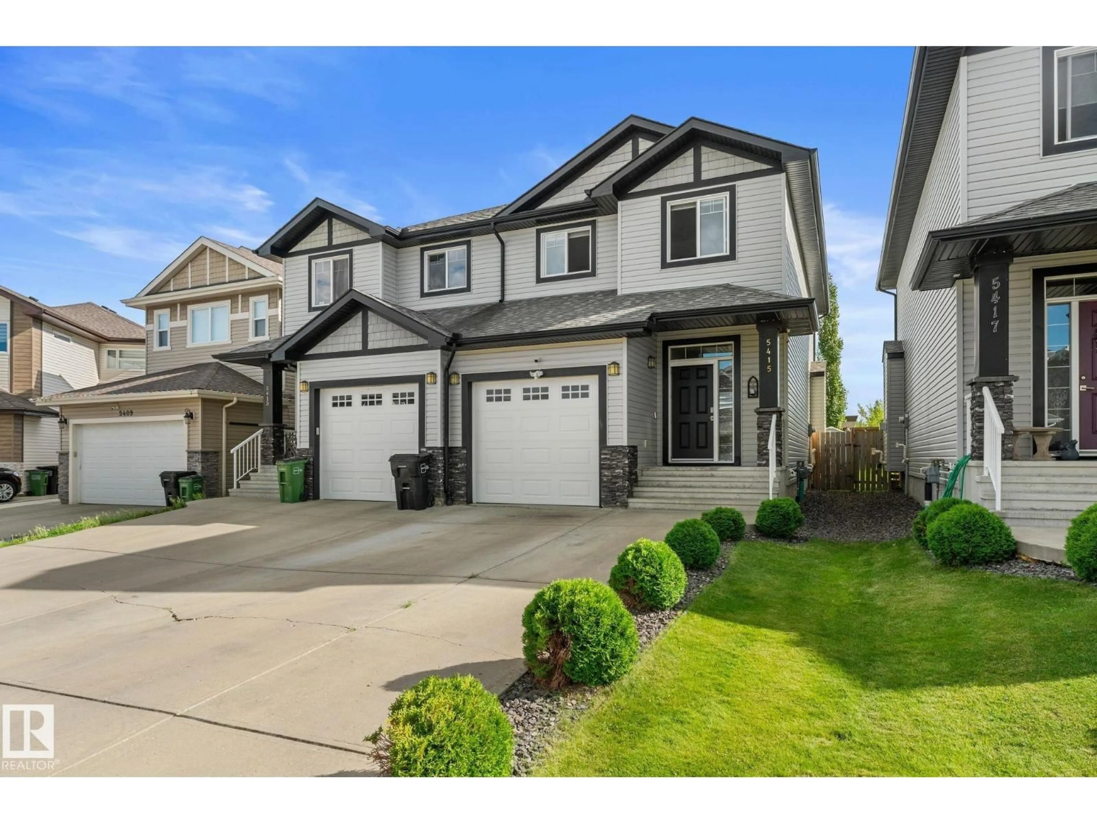 Home with vinyl exterior material, street for 5415 167A AV, Edmonton Alberta T5Y0R4